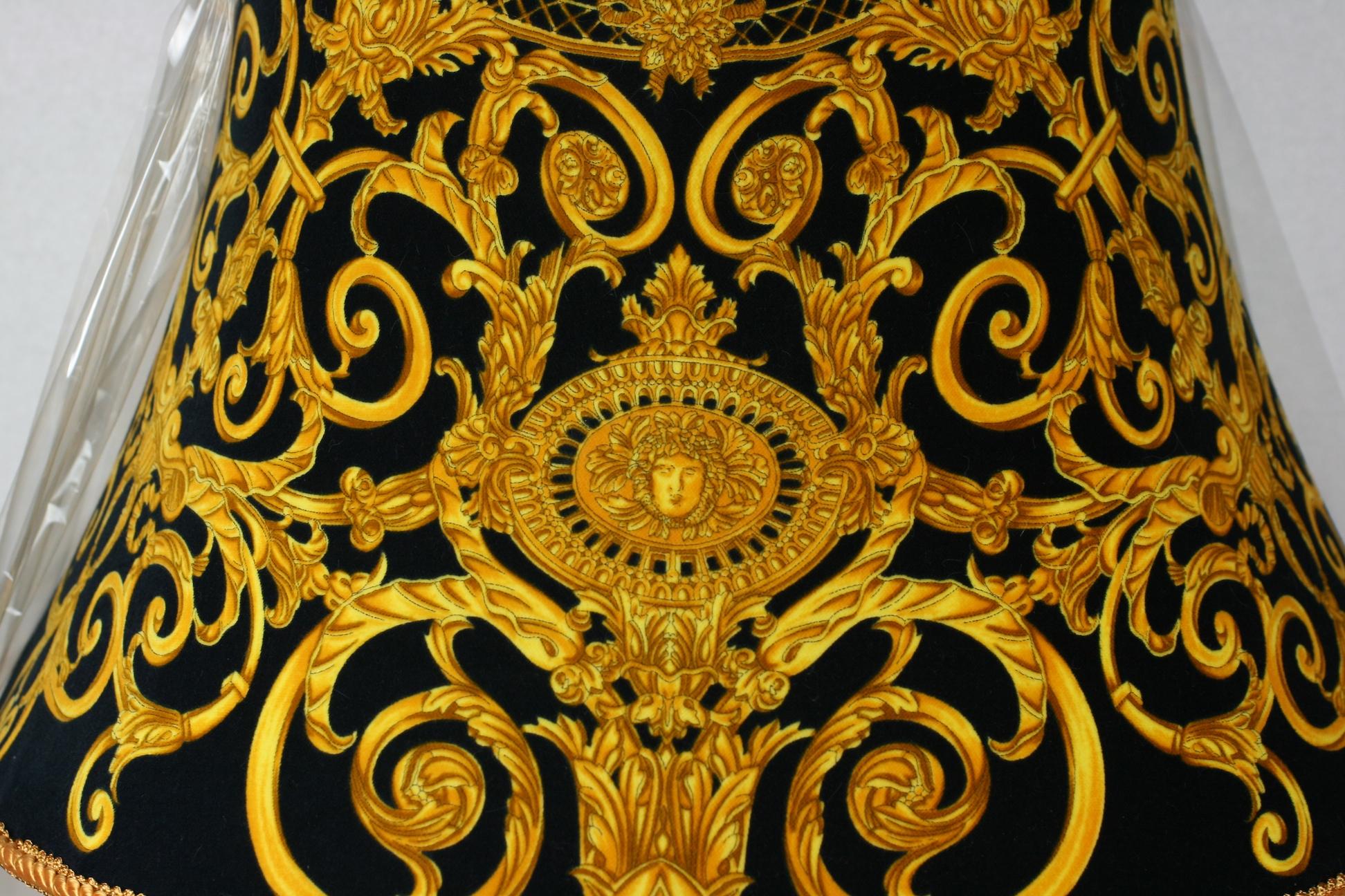 Rare Gianni Versace Classic Barrocco screen printed cotton velvet lampshade. The velvet shade in the Classic gold, white on a black ground with focal signature Medusa. Bound in gold hand sewn braid with ivory silk lining trim. Unused in original