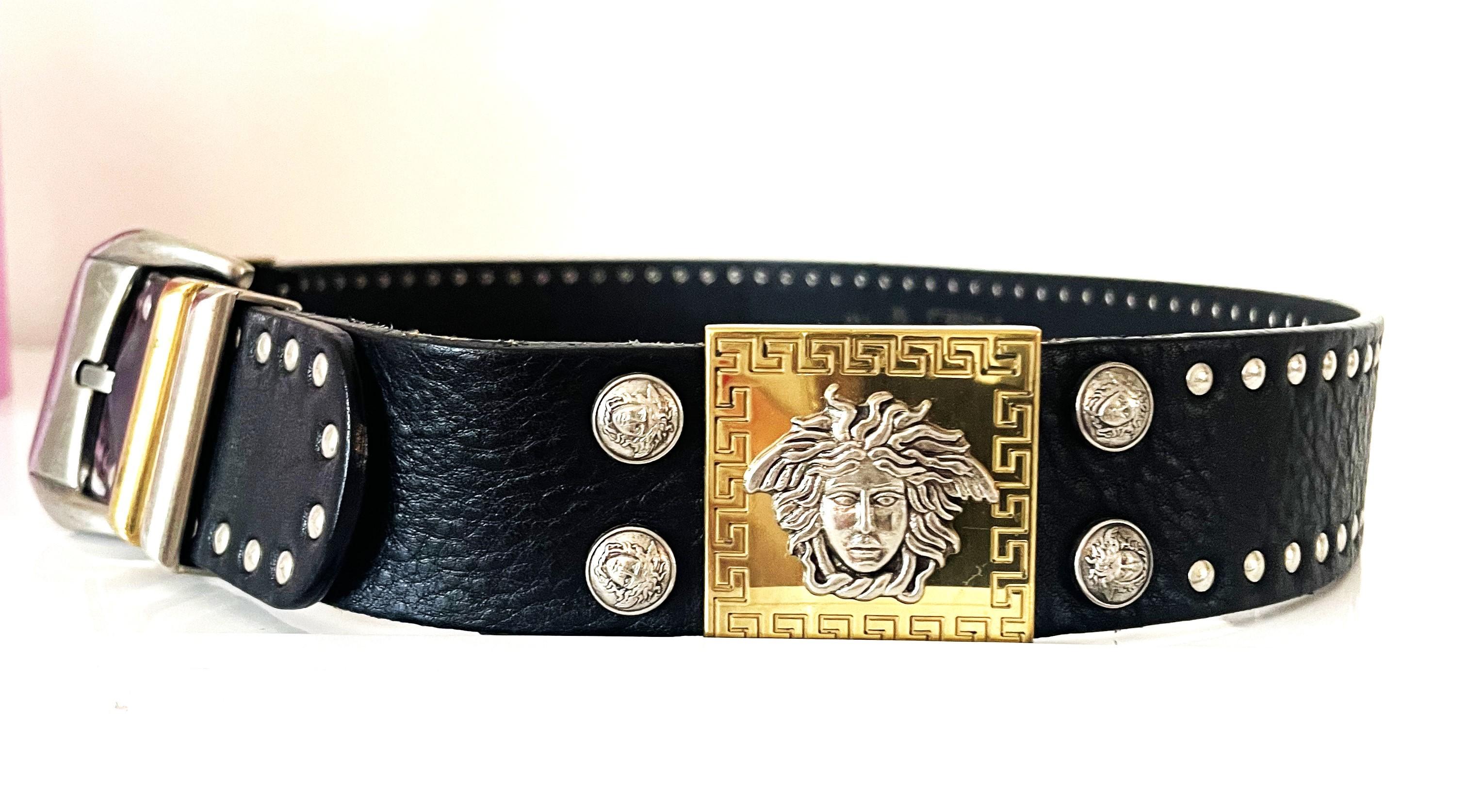 Stunning & rare collectors item this eye catching 90's Gianni Versace studded leather Belt from the runway 1992 (hard to find similar because of the square frame), Two tone buckle and large silver Medusa on gold square backing framed with small
