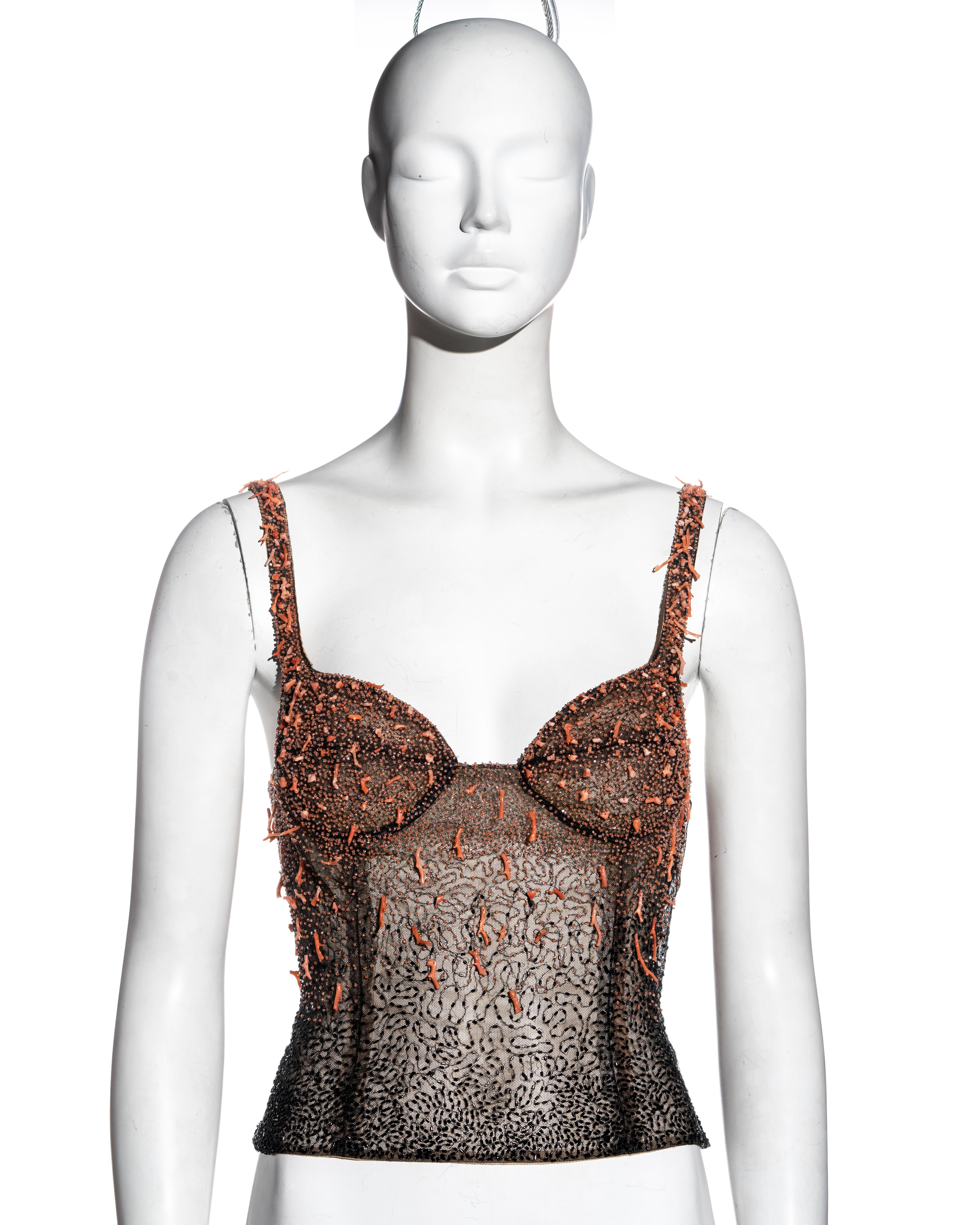 ▪ Gianni Versace black beaded mesh corset top
▪ Black and coral beading
▪ Coral branch embellishments 
▪ Semi-sheer 
▪ IT 40 - FR 36 - UK 8 - US 4
▪ Fall-Winter 1999
▪ 100% Nylon 
▪ Made in Italy