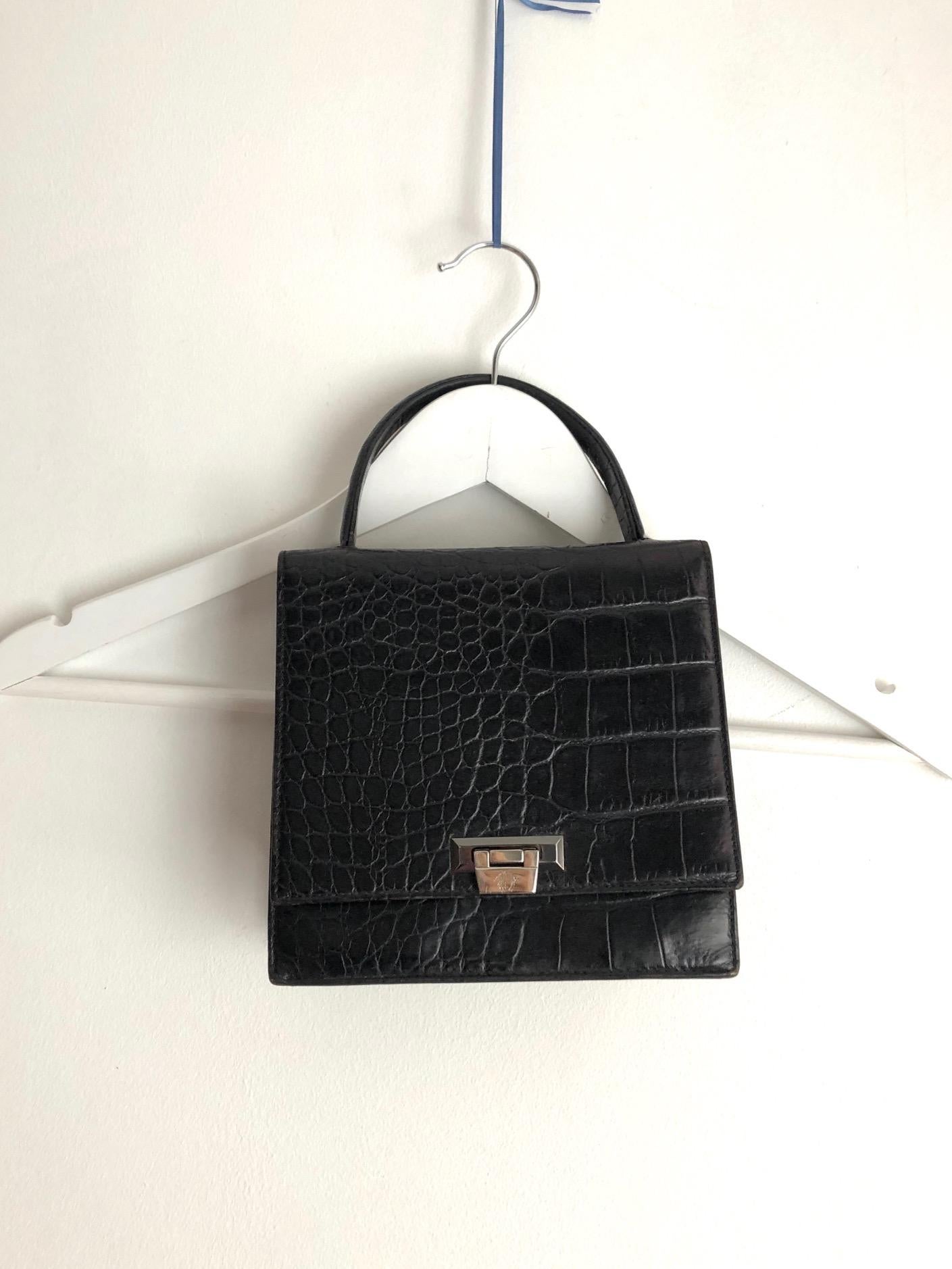 FREE UK and WORLDWIDE DELIVERY 

Gianni Versace black crocodile print leather clutch tote mini bag in like new condition, medusa emblem on silver ware clutch closure, flap front, 2 internal compartments, inside pocket
Condition: vintage, 1990s, very