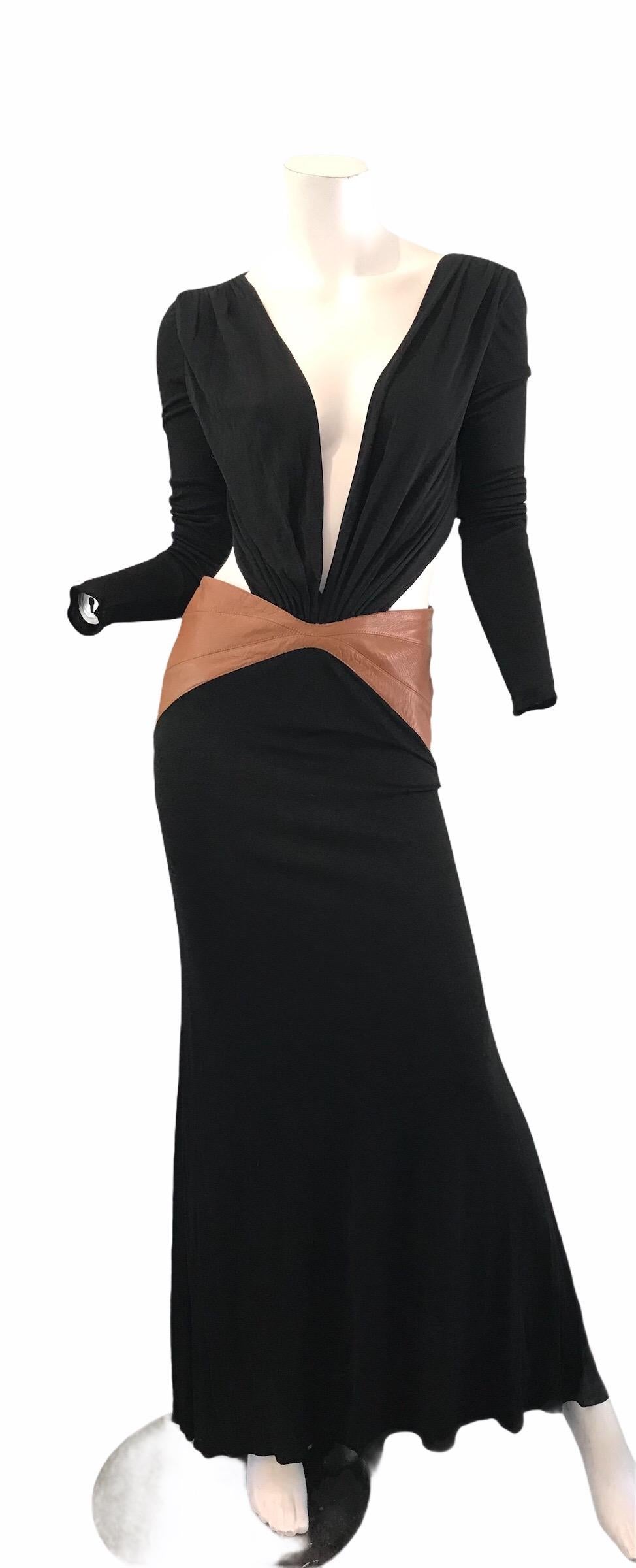 Gianni Versace black jersey gown with brown leather accents. Condition: Very good. Size S/ M 