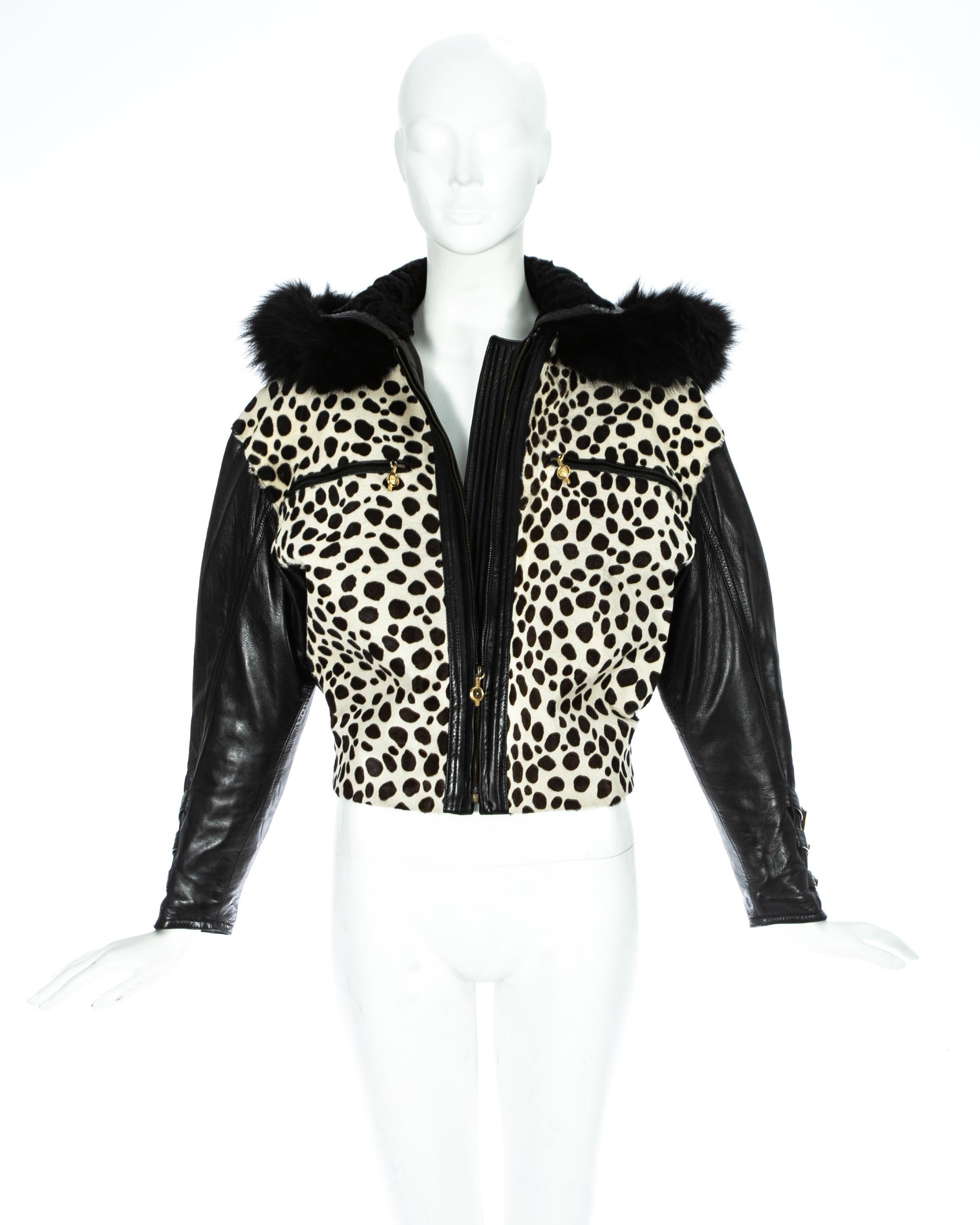Gianni Versace

- Animal print pony hair at front/
- Black fox fur hood with Astrakhan fur 
- Gold and silver metal buckles on cuff and waist 
- Quilted lining 

Autumn-Winter 1992