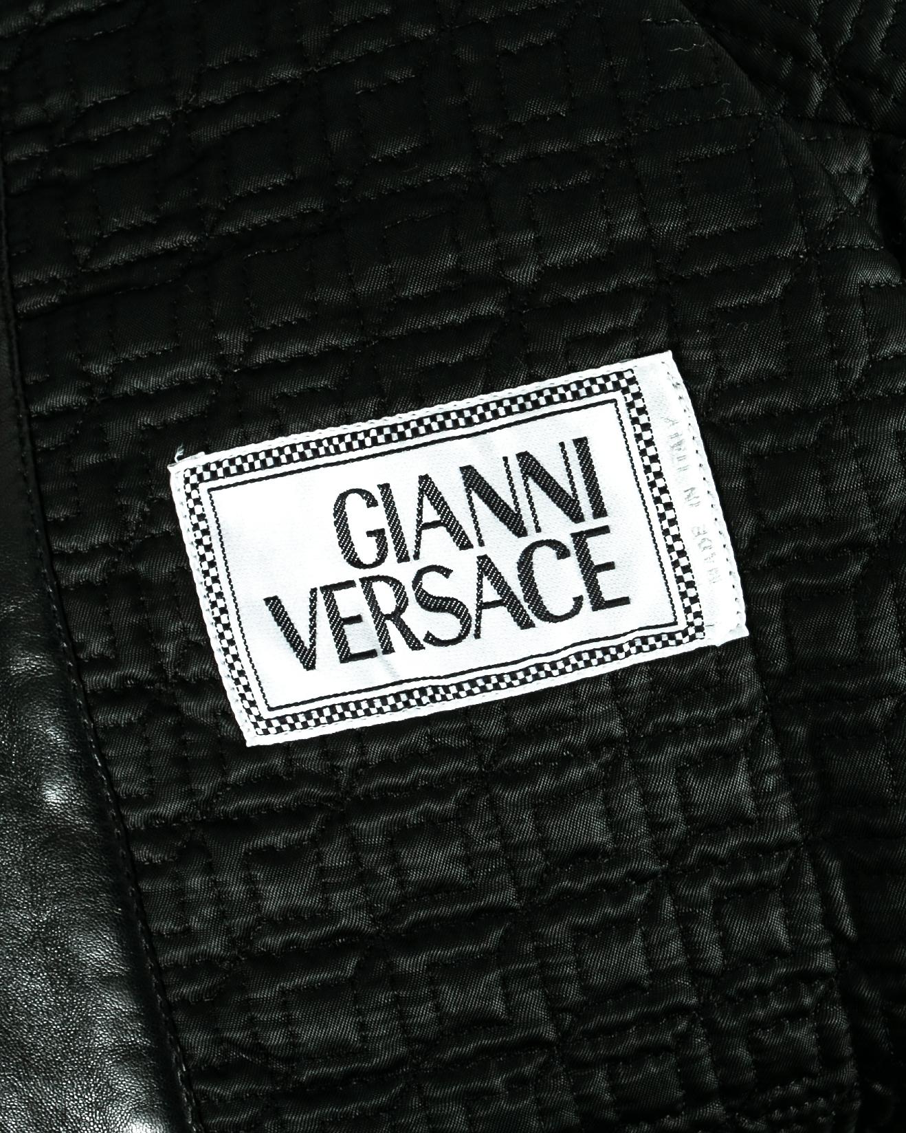 Gianni Versace black leather and pony hair bomber jacket with fur hood, AW 1992 For Sale 1