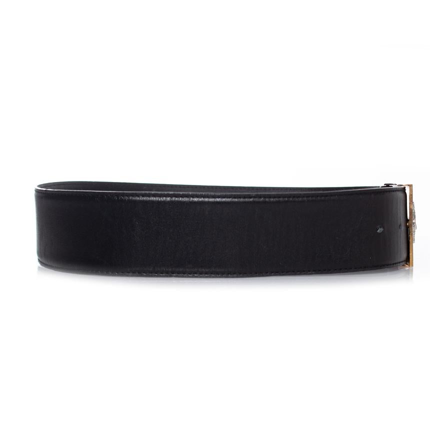 Gianni Versace, black leather belt with medusa buckle. The item is in good condition, buckle has light scratches and leather has some wrinkles. Leather has become a bit dry due to aging.

• CONDITION: good condition 

• SIZE: 75/30

• MEASUREMENTS: