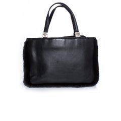 Gianni Versace, black leather handbag with fur