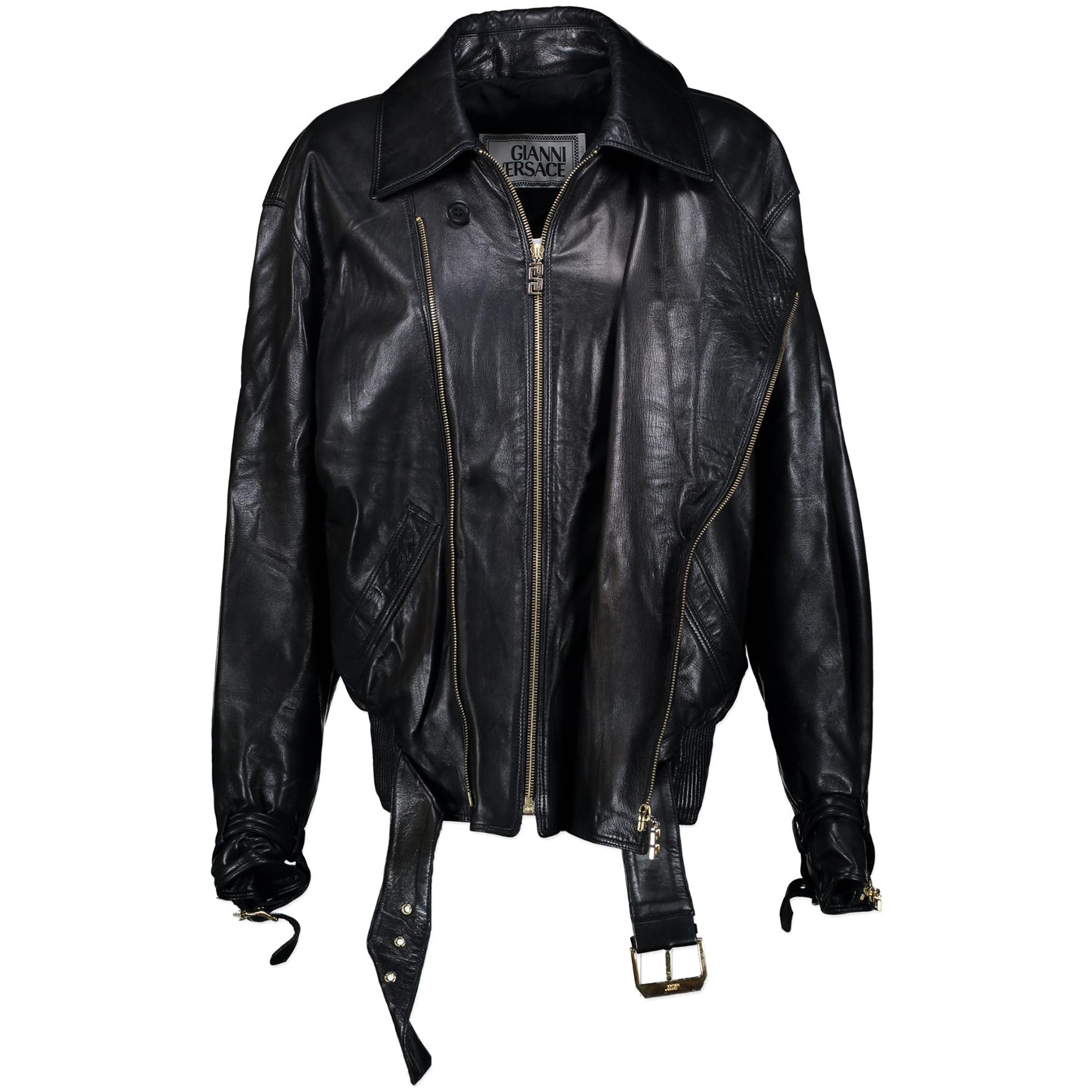 This unisex Gianni Versace Black Leather Motorcycle Jacket will fit for a size S (oversized) or Medium. The soft leather features gold hardware details and an elastic waist band. Zippers and decorative belt.
