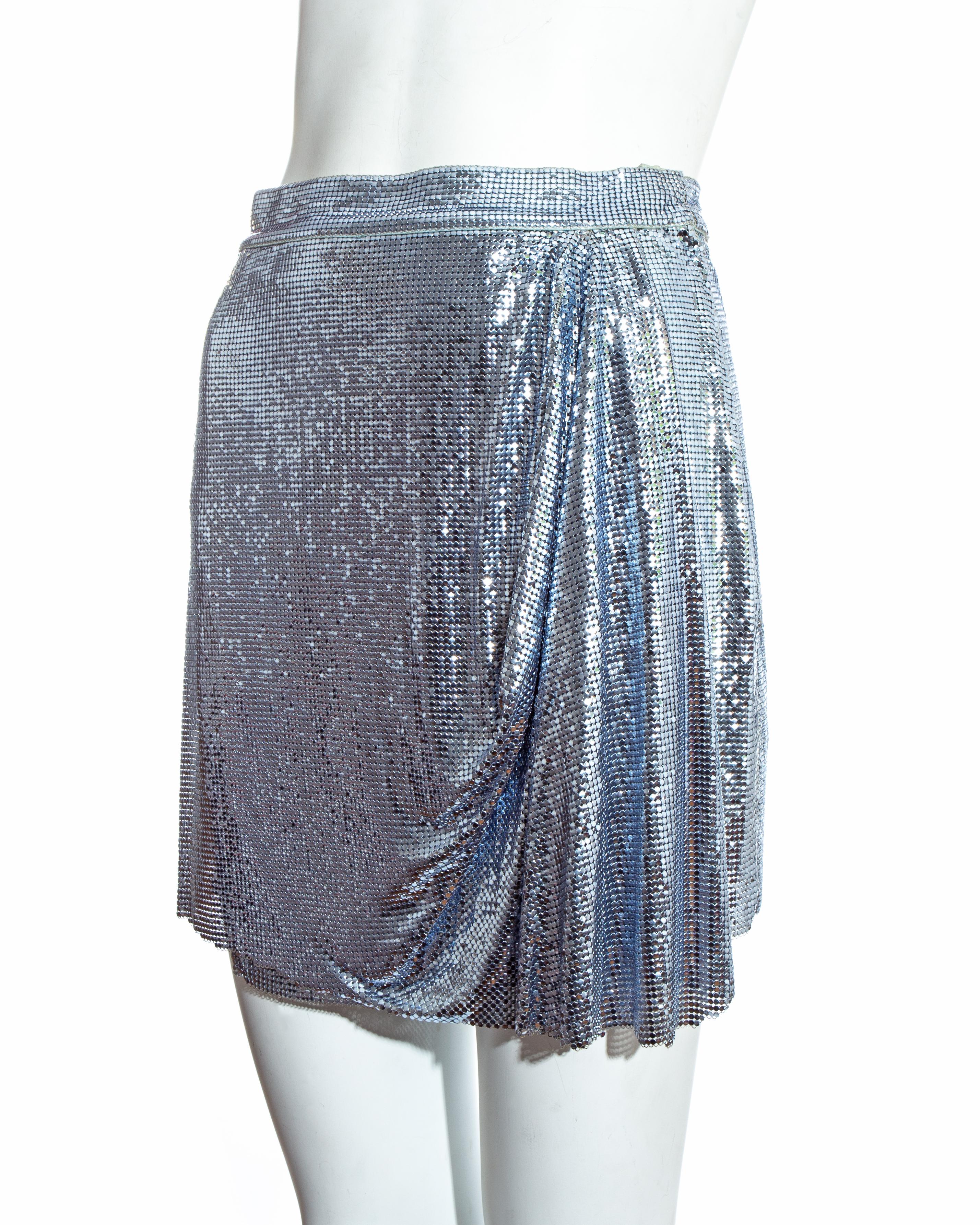 Gianni Versace metallic blue Oroton chainmail draped evening mini skirt. 

Fall-Winter 1994