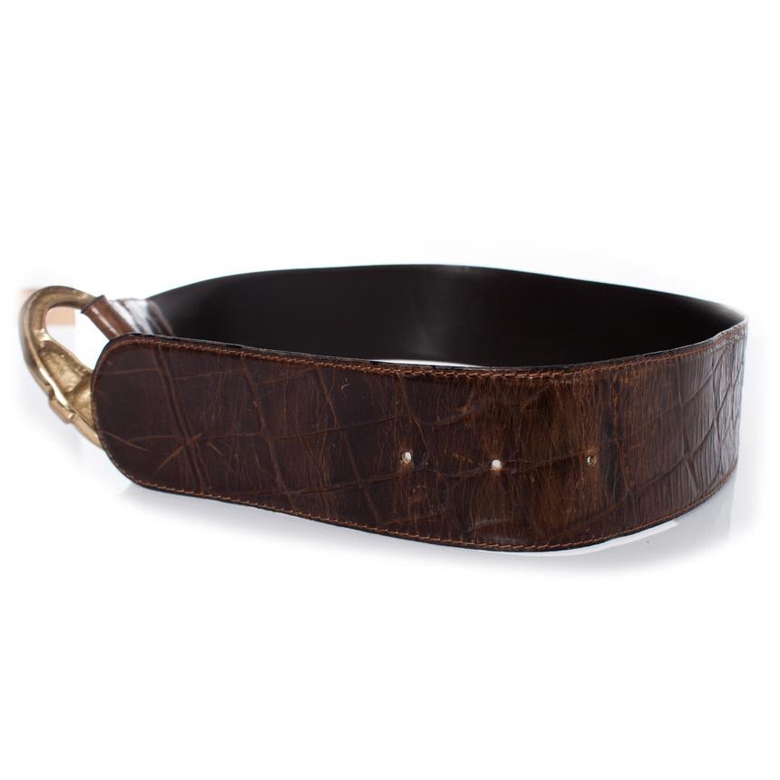 Gianni Versace, Brown croc stamped leather belt with gold hardware. The item is in good condition. Hardware and the leather both have scratches and wrinkles.

• CONDITION: good condition 

• SIZE: 85/34

• MEASUREMENTS: length 89 cm, width 6 cm

•