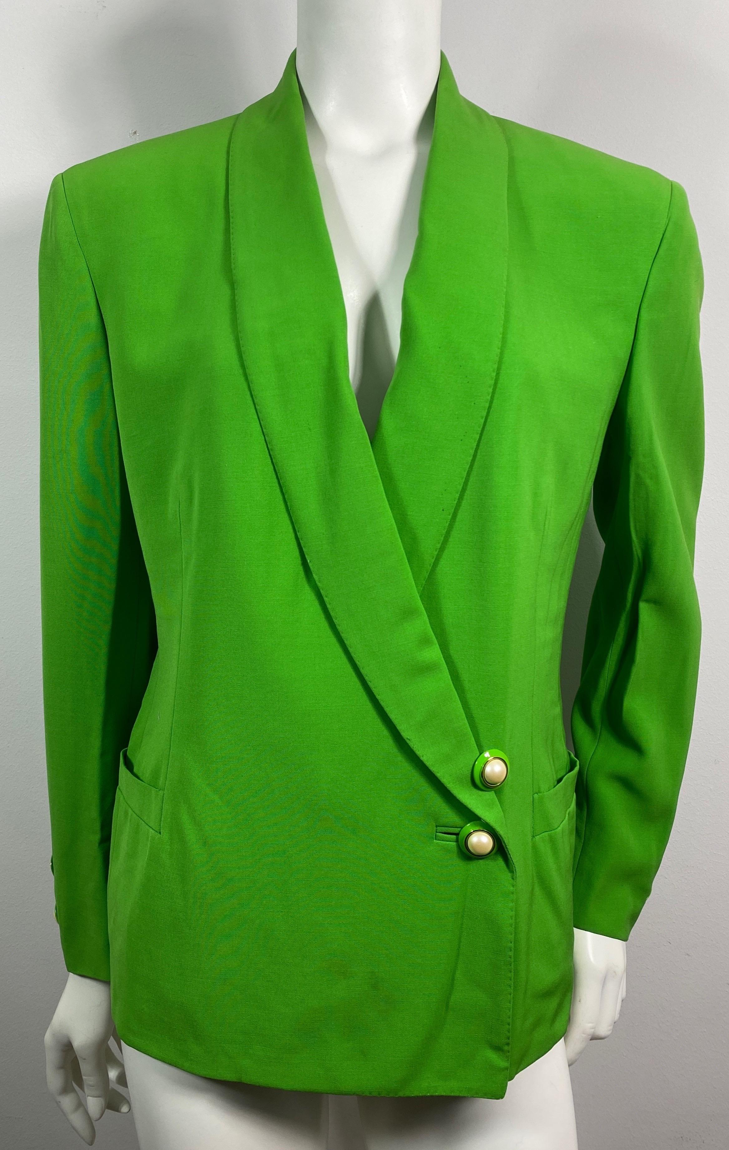 Gianni Versace Couture 1990’s Neón Green Double Breasted Jacket-Size 42. This collectible piece of Versace 90’s history is made of a neon green silk wool blend, large shoulder pads, Double breasted although the only buttons you see are two large