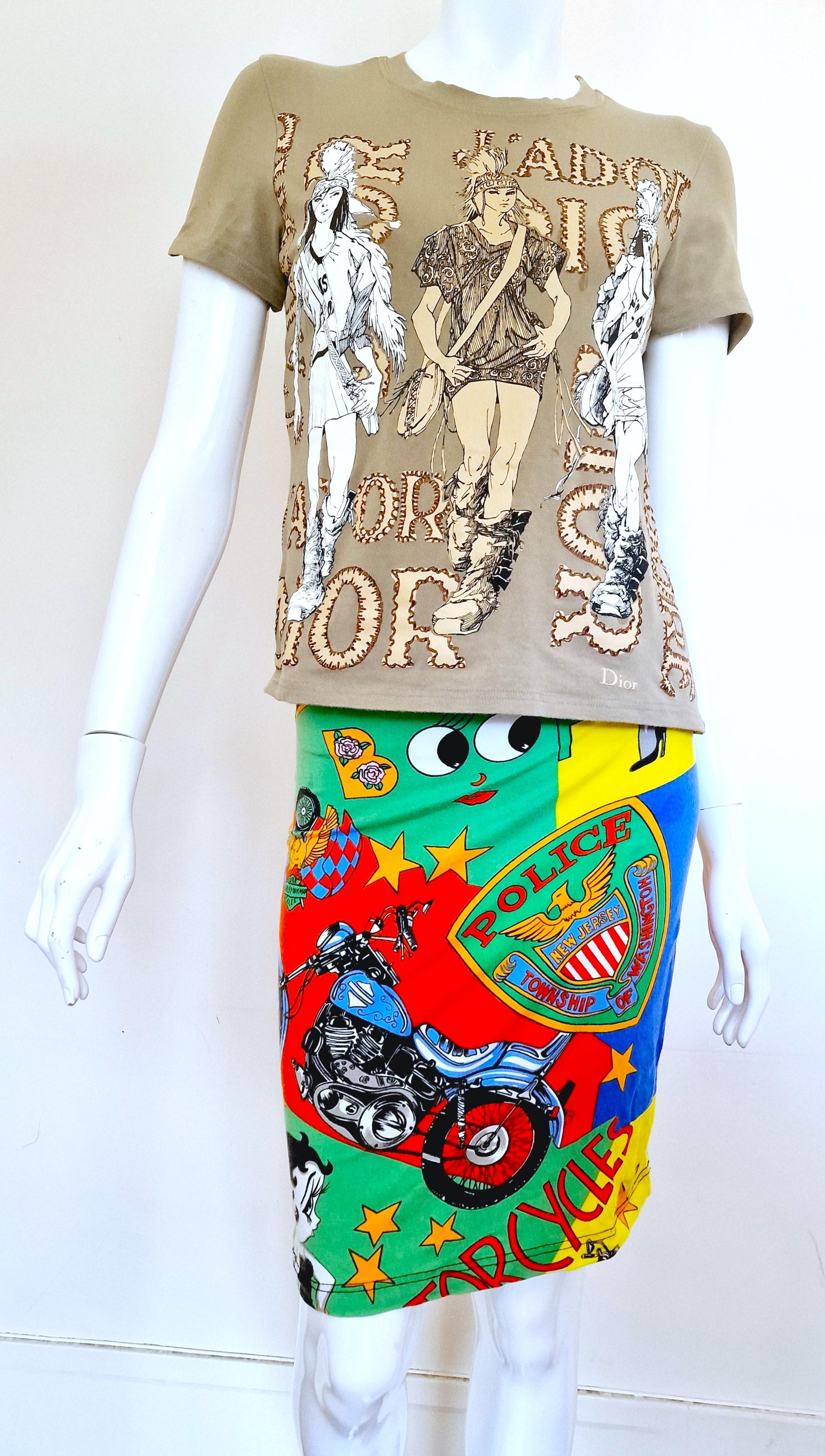 Betty boop skirt by Gianni Versace!
Go back to the 90s!

Pattern: 
Betty Boop
Stars
Motorcycles
Cars
Roses
Pin up symbols
New Jersey logo - Police, Township of Washington

While Kardashian and Miley Cyrus wore the dress and overalls version.

Marked