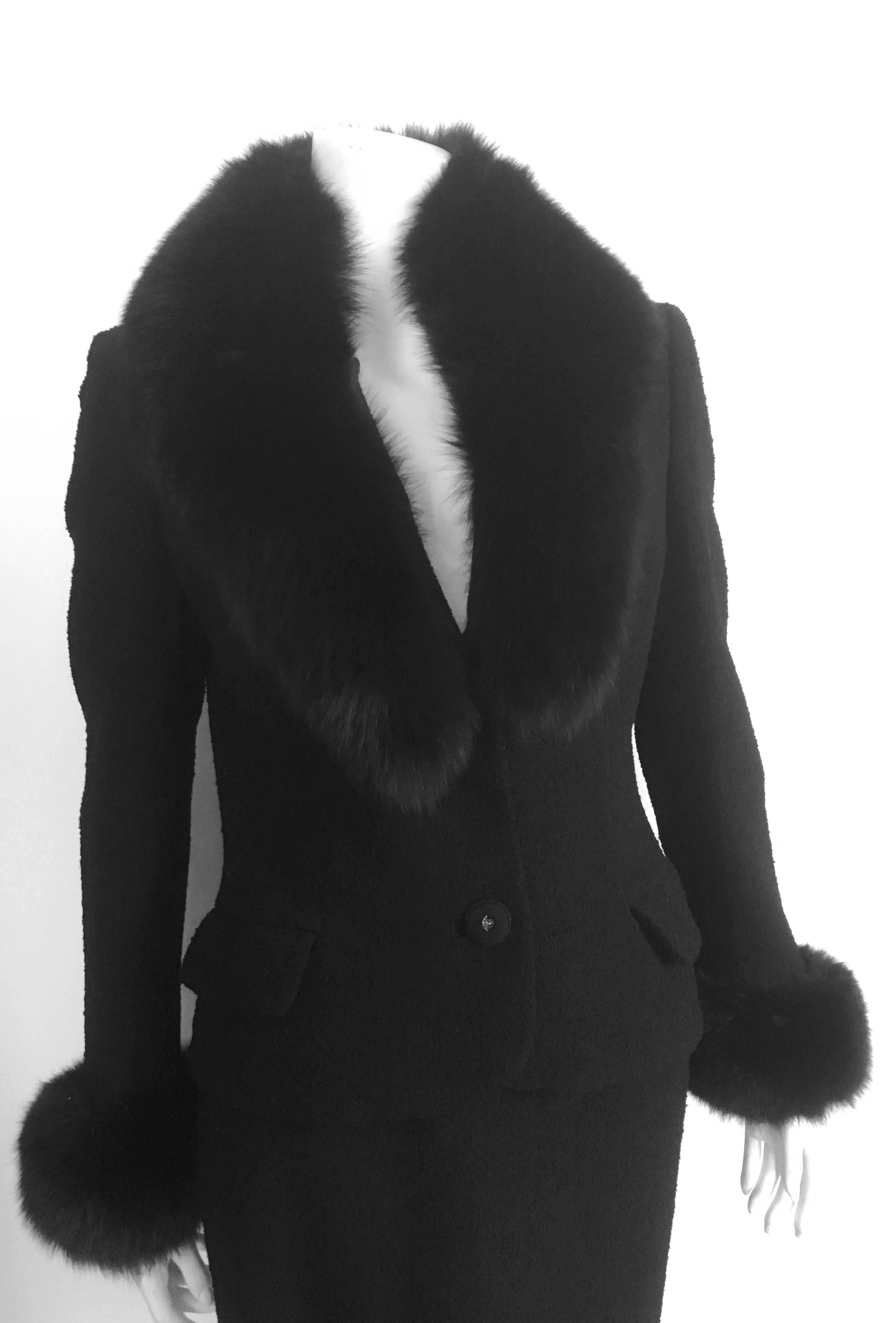 Gianni Versace Couture 1990s black boucle wool with fur collar & cuff jacket with long skirt is an Italian size 40 and fits like a size 4. Detachable fur collar and both pieces are fully lined. One of the loops on the detachable fur collar is