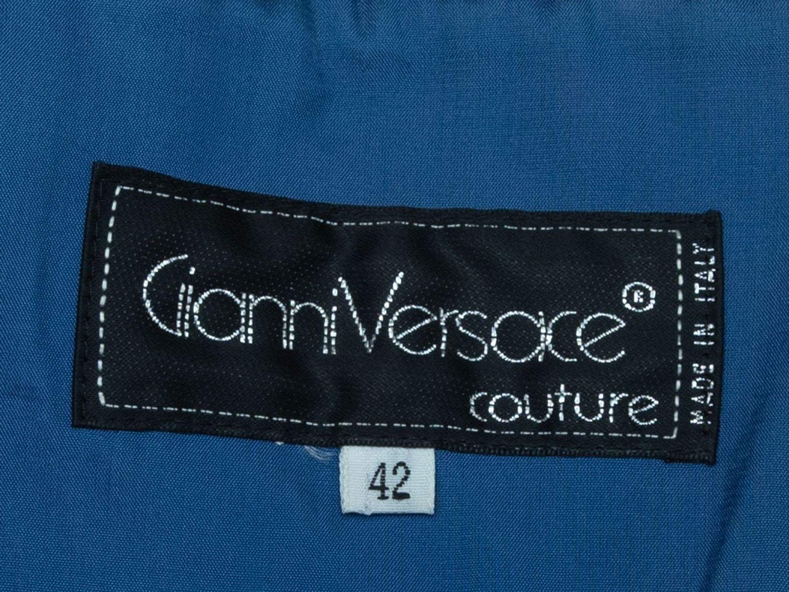 Product Details: Vintage blue strapless top by Gianni Versace. V-neck featuring ribbed texture. Zip closure at side. Designer size 42. 28
