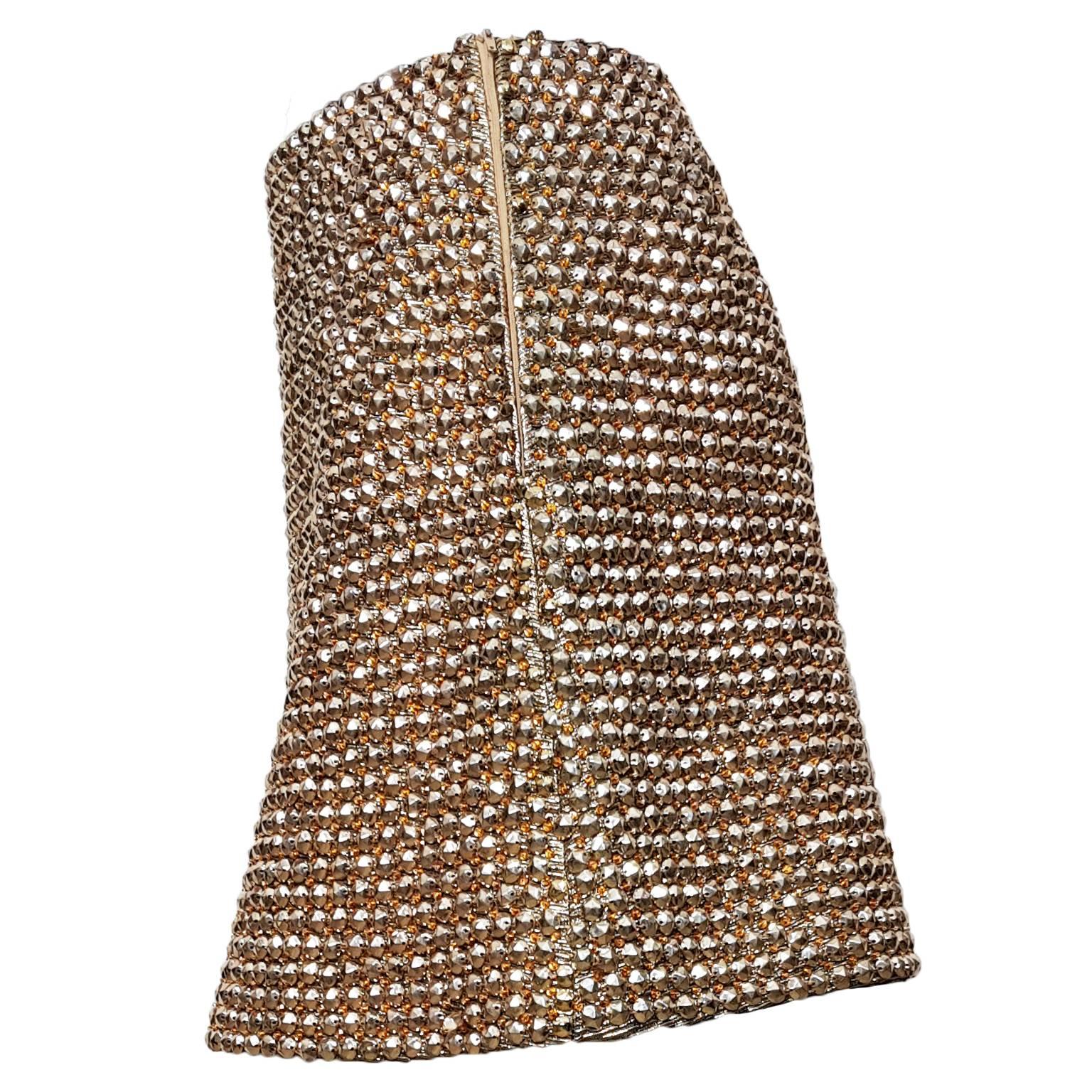 Iconic Gianni Versace couture gold tone beaded skirt aw 1994.
Size : 42 (IT)
Measurements : 
Waist : 70 cm
Length : 38 cm