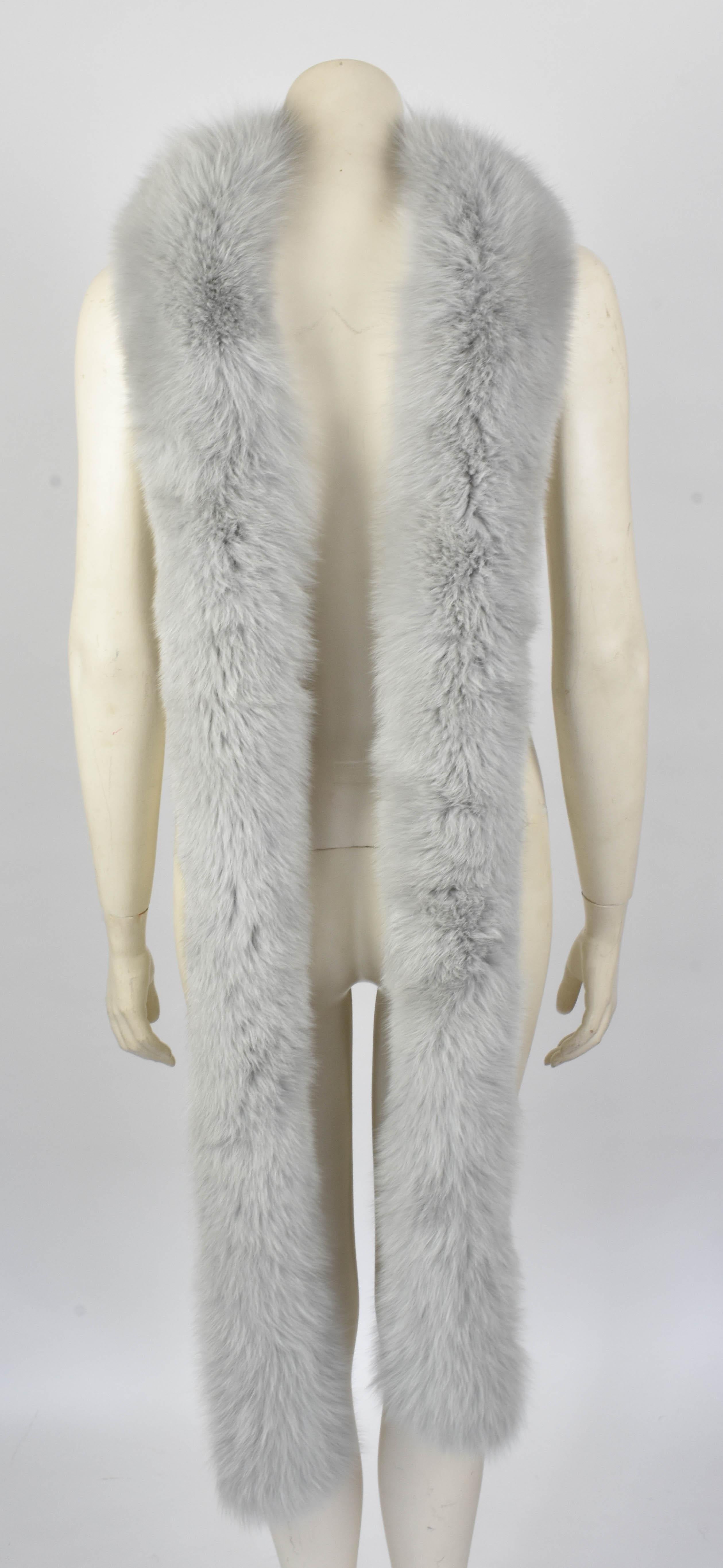 This scarf by Gianni Versace Couture is very fluffy and soft as it is made from real fox fur. It is extremely long so it can be worn in different manners. A similar scarf was shown in the Atelier Versace show in 2014.

Perfect condition