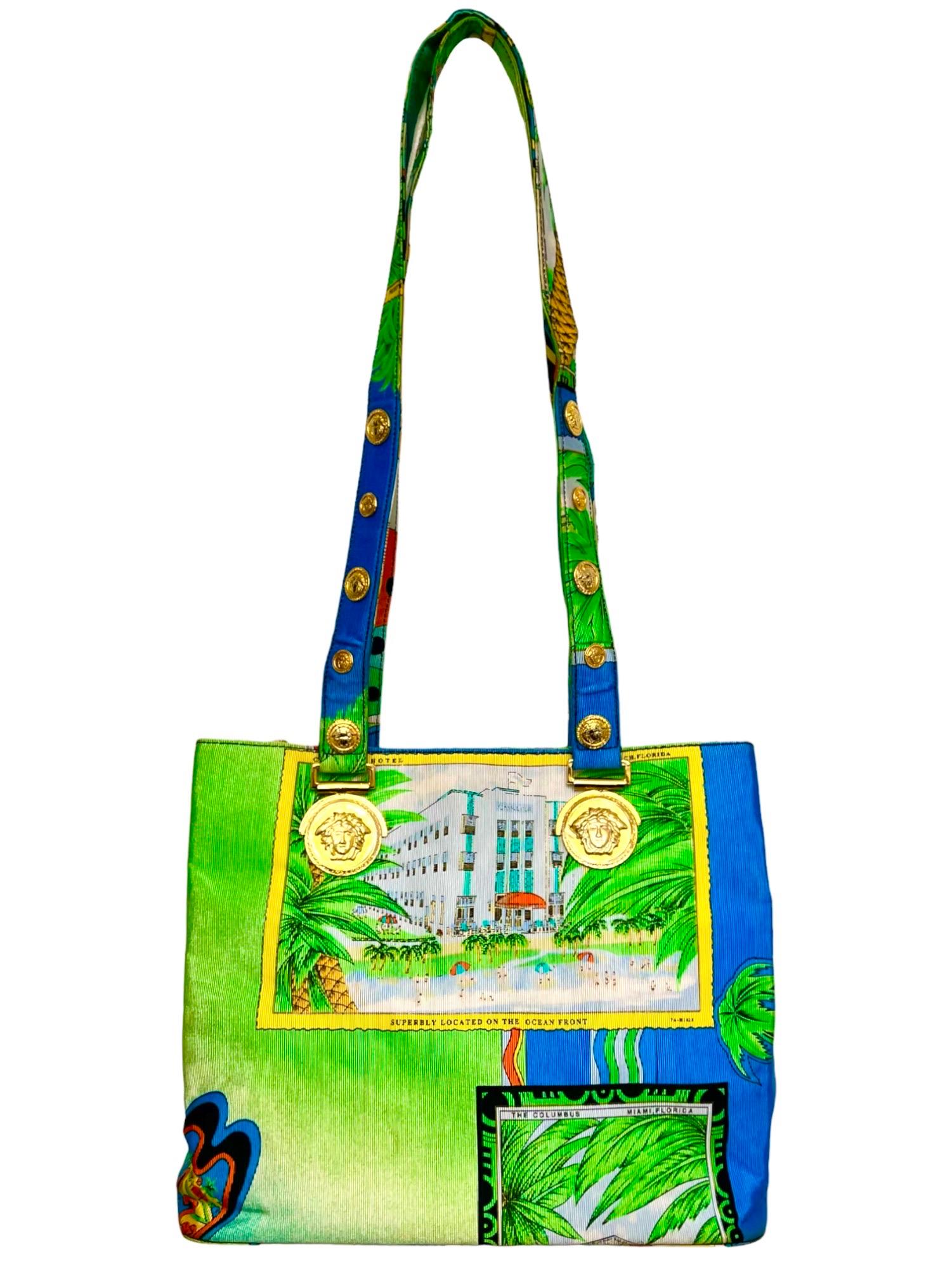 Gianni Versace Miami large silk shoulder bag from 1993 with Medusa Medallions,

South Beach Miami print of tropical vintage ocean front themes can be seen throughout with pop art Miami and Florida lettering.

Condition: Condition is excellent. There