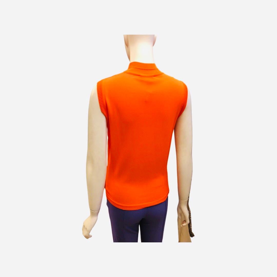 - Vintage Gianni Versace Couture neon orange rayon mock neck sleeveless top from spring 1996 collection. 

- Ribbed mock neck,  armpit and hem. 

- Size 40. 

- 90% Rayon, 10% Spandex/Nylon. 