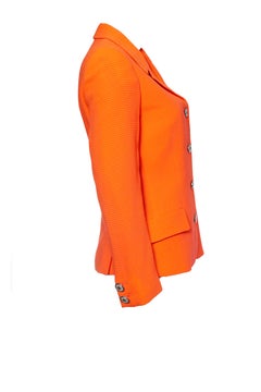 Gianni Versace Couture, Orange blazer and skirt with medusa buttons