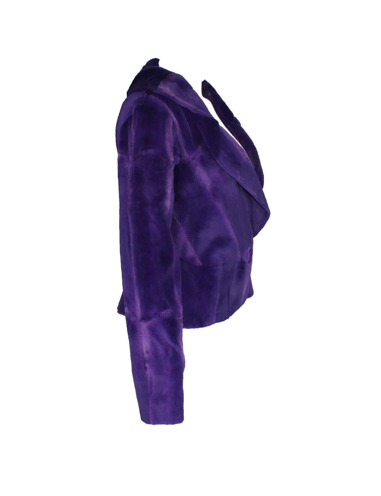 

A great piece  by GIANNI VERSACE COUTURE
This gorgeous jacket is made out of finest amethyst-colored fur
From the famous FW 2000 collection
Softest, lightweight fur
Very versatile
Fully lined
Closes in front with two hidden clasps
Made in