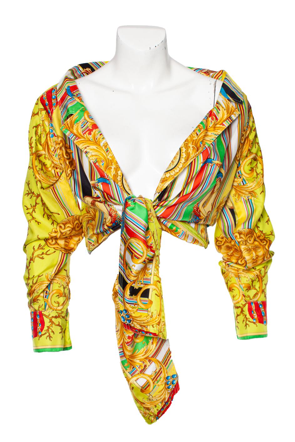 Gianni Versace Couture, Runway off shoulder silk blouse with multicolored print. The item is in very good condition. Suitable for many sizes. (SS1993)

• CONDITION: very good condition 

• SIZE: IT40 - XS 

• MEASUREMENTS: length 58 cm, width 43 cm,