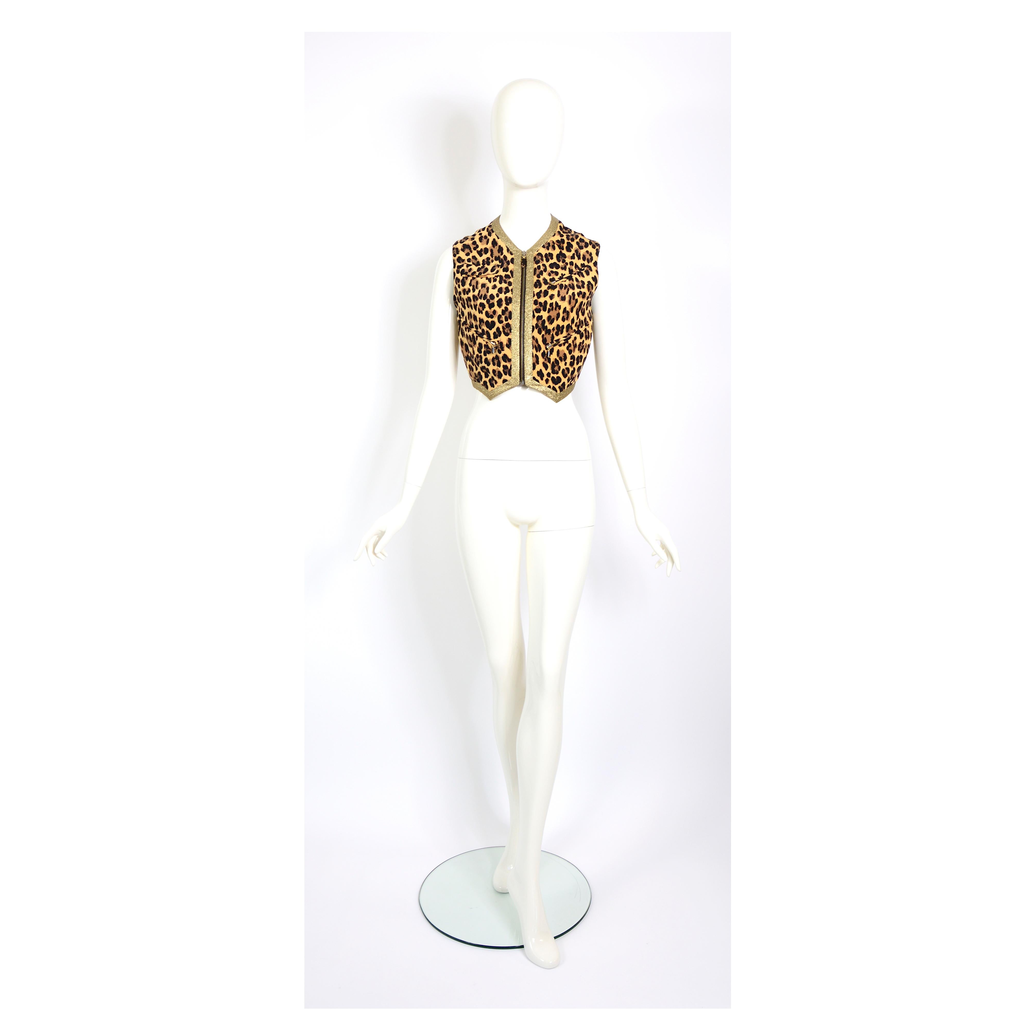 This Iconic SS 1992 GIANNI VERSACE COUTURE silk leopard print vest with gold lurex piping vintage collector's item and seen on Stephanie Seymour walking the show.

Label GIANNI VERSACE COUTURE, Italian size 38 or 4.
Measurements that are taken