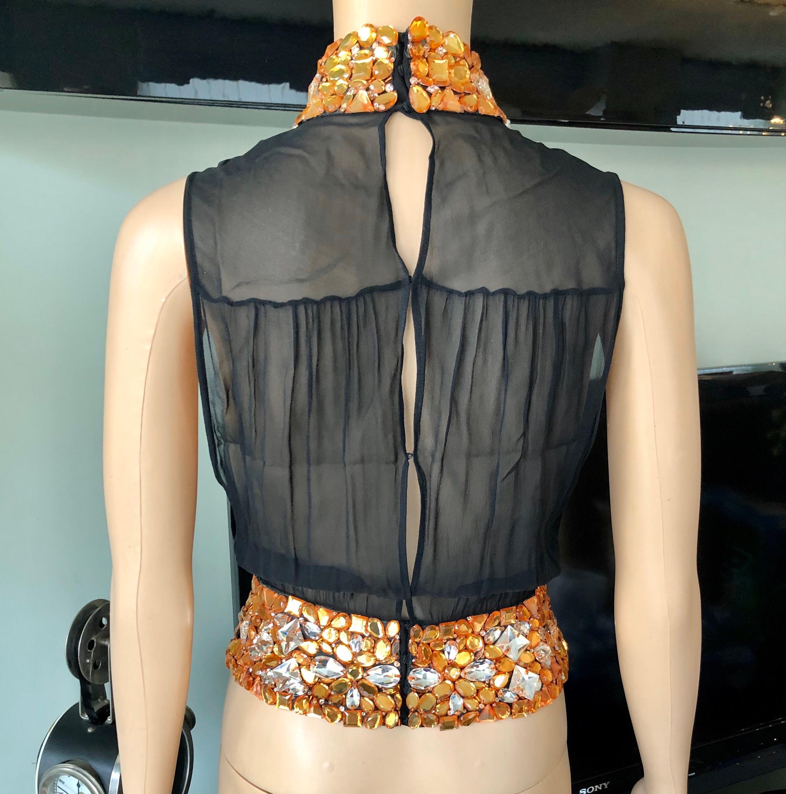 da uomo o donna Gianni Versace Couture P/E 2000: Top e pantaloni trasparenti impreziositi dalla passerella in vendita