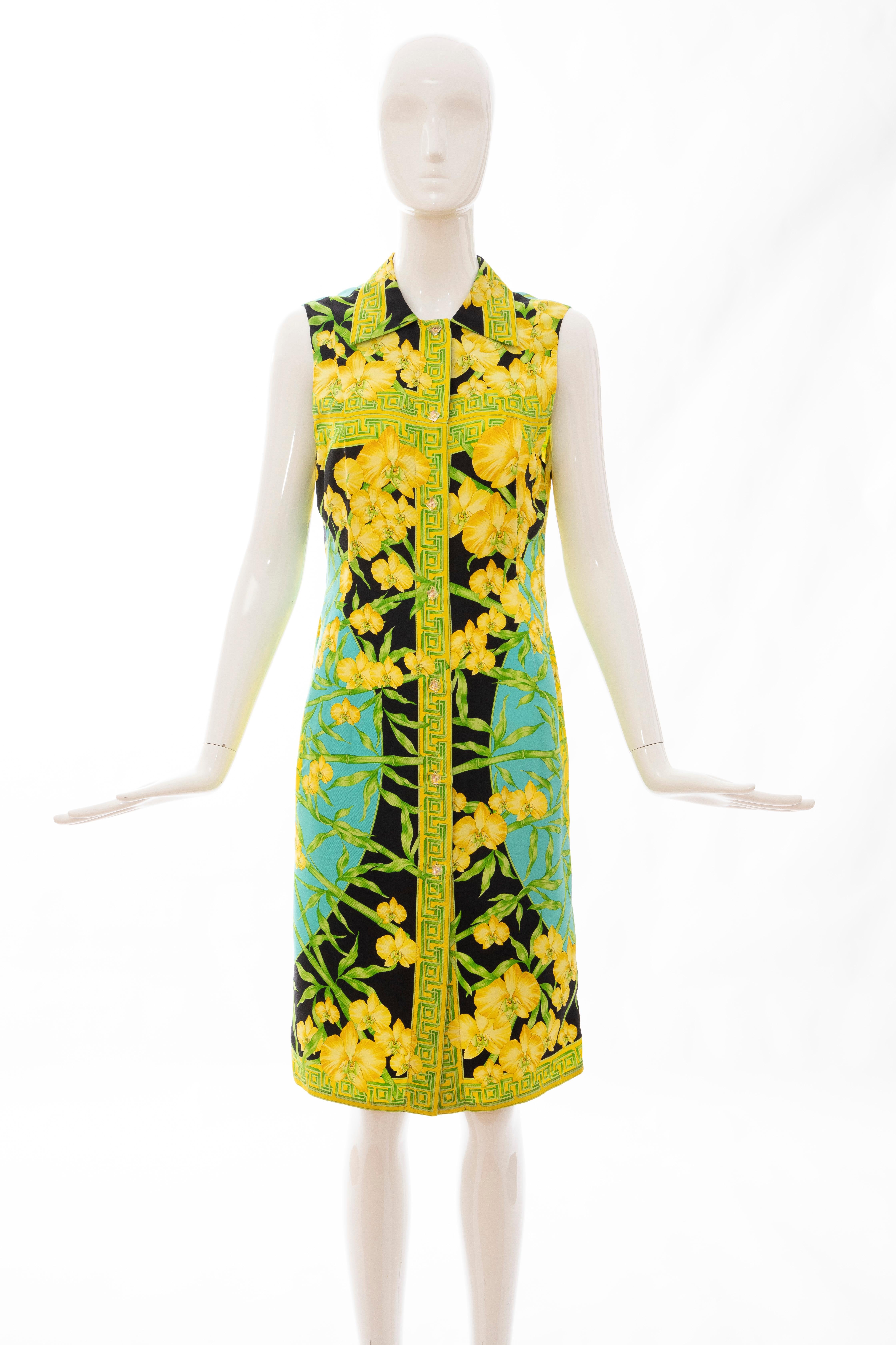 Gianni Versace Couture, Circa: 1990's, silk printed yellow orchids, aurora borealis button front sleeveless sheath dress with pointed collar.

IT. 44, US. 8

Bust: 34, Waist, 31, Hips: 40, Shoulder: 14, Length: 41
