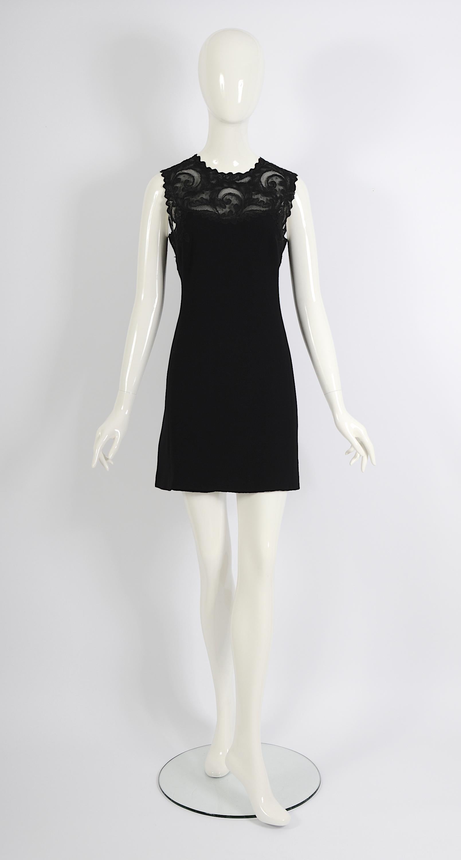 Vintage Gianni Versace couture fall winter 1996 sleeveless with crew neck trim embellishment mini shift dress.
Concealed Zip Closure at Back
The size label is missing please use the measurements that are taken flat: 
Sh to Sh 14inch/36cm - Ua to Ua