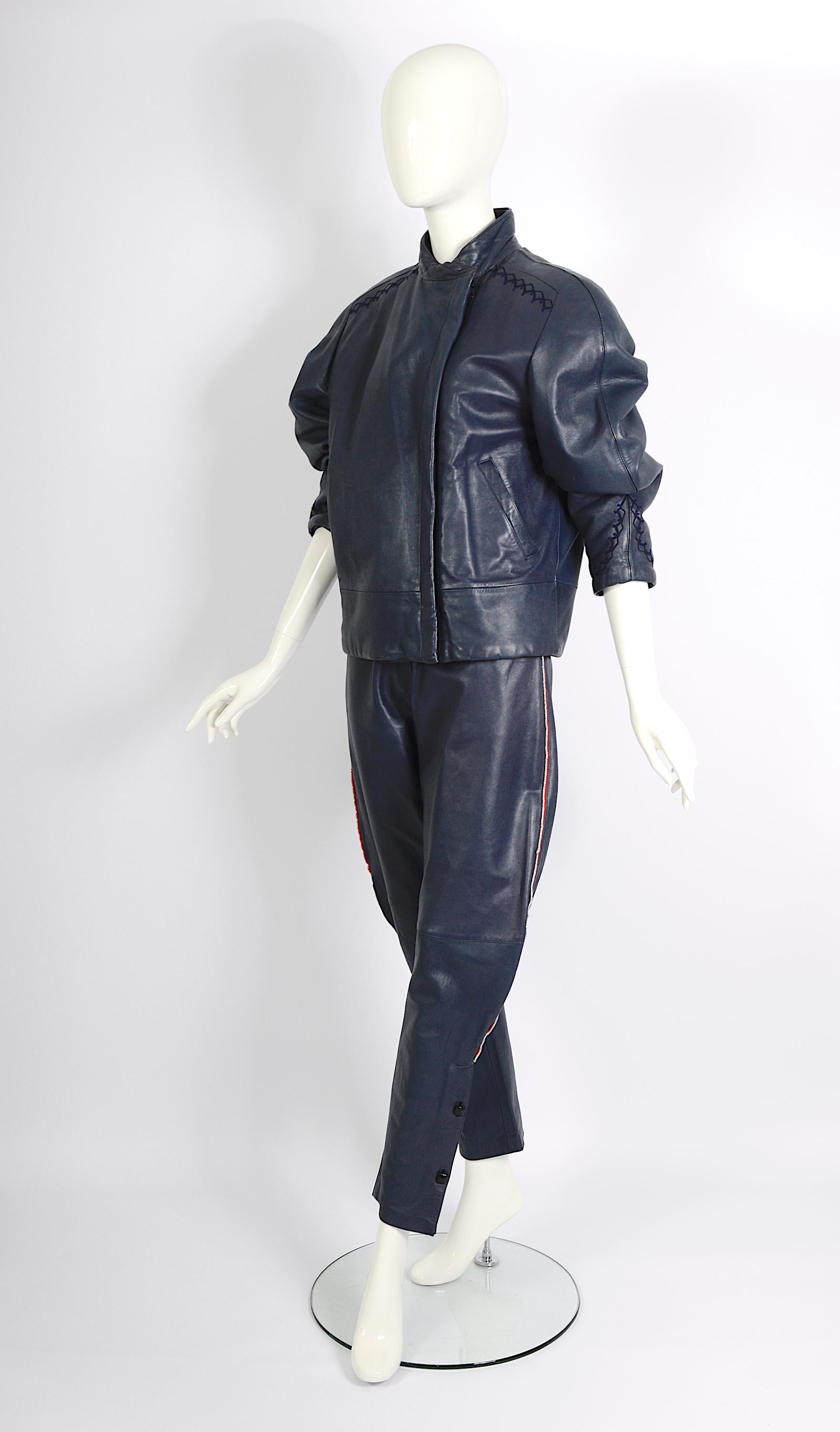 This stunning blue leather ensemble originates from Gianni Versace's iconic 1981 Fall-Winter collection, marking a pivotal moment in the fashion world. Versace's debut boutique in 1978 heralded an era of immediate popularity, propelling the brand to
