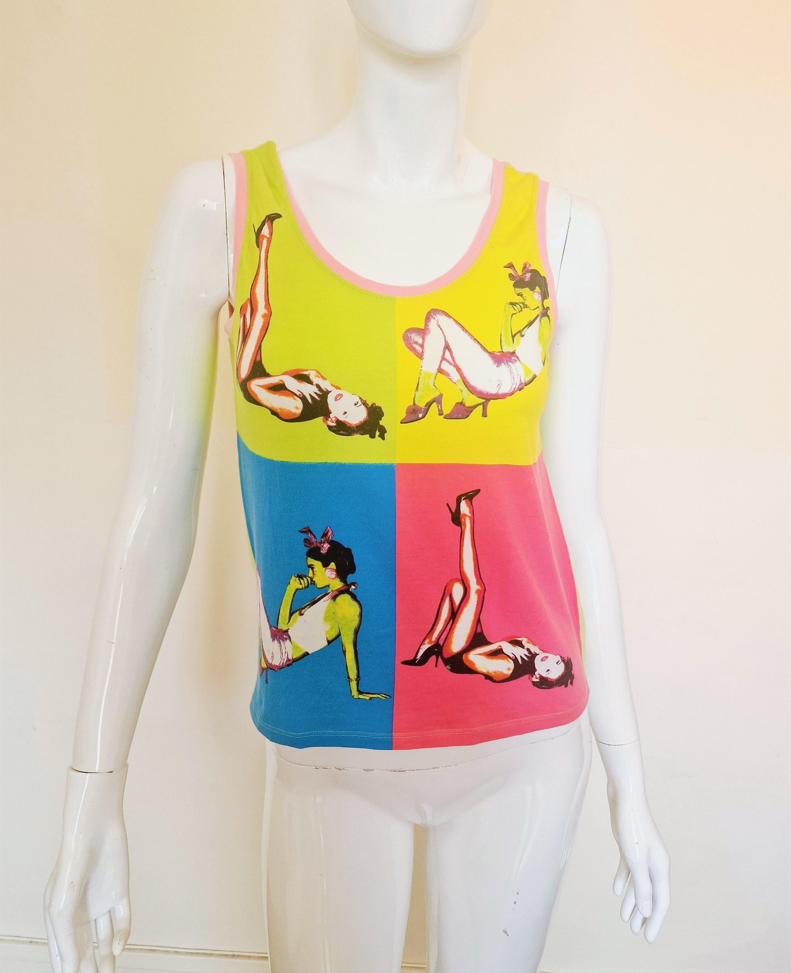 Lollipop pin up girl top by Versace!
From the Spring Summer 2004 collection! 
Donatella vibe :) 

VERY GOOD condition!

SIZE
Marked size: IT44. 
Women: large.
Men: small/medium.
Length: 53 cm / 20.9 inch
Bust: 43 cm / 16.9 inch

100% cotton.
Made in