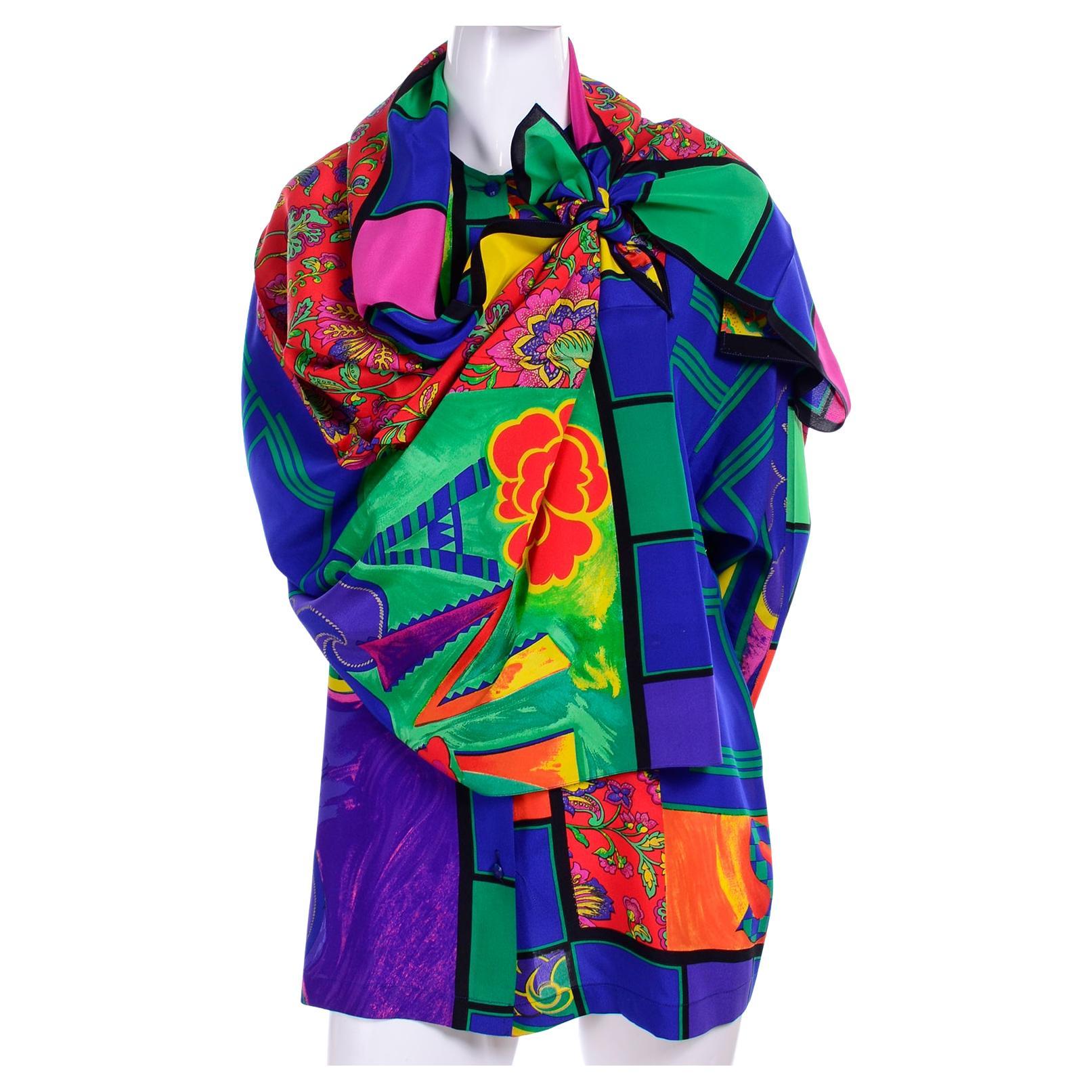 This is a late 1980's or early 1990's vintage Gianni Versace silk shirt in a beautiful mixed pattern print. The shirt comes with its oversized coordinating scarf and was designed by Gianni Versace . The botanical print is in vibrant shades of blue,