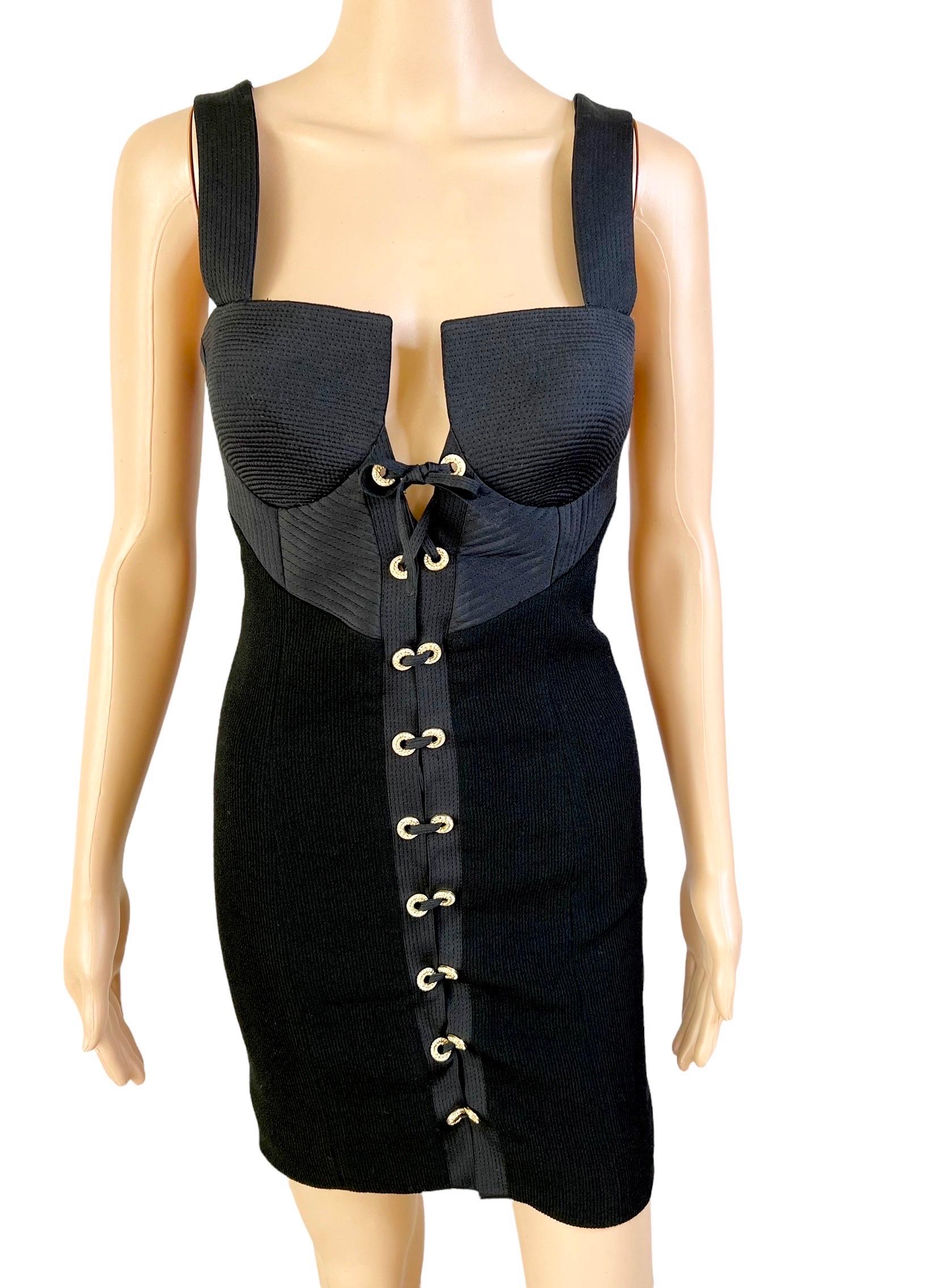 Gianni Versace S/S 1992 Couture Bustier Corset Lace Up Black Mini Dress IT 42

Condition: A couple missing embellishments on the grommets as is common with Gianni Versace pieces, not noticeable when worn.