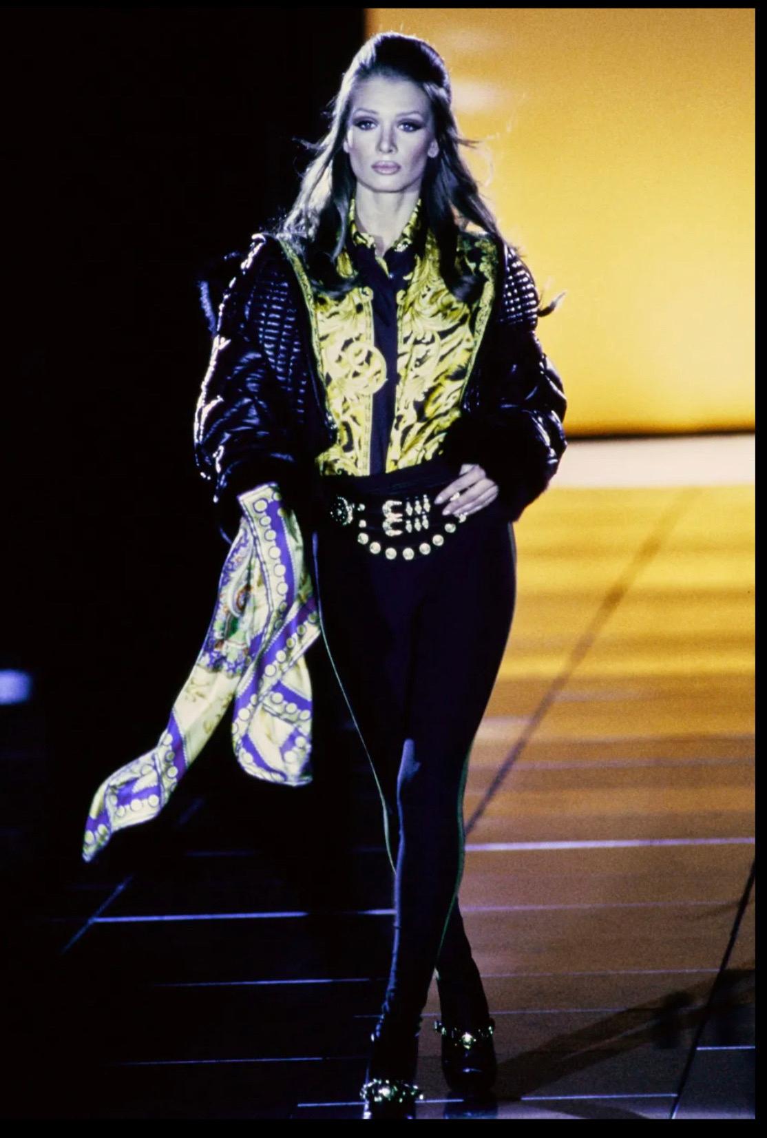 Extremely rare museum piece GIANNI VERSACE Runway Fall / Winter 1992 Bondage Collection leather, fox fur and astrakhan fur black runway jacket ! Angelina Kallio modeled this on the runway for Look # 46. Leather jacket is stuffed with down for