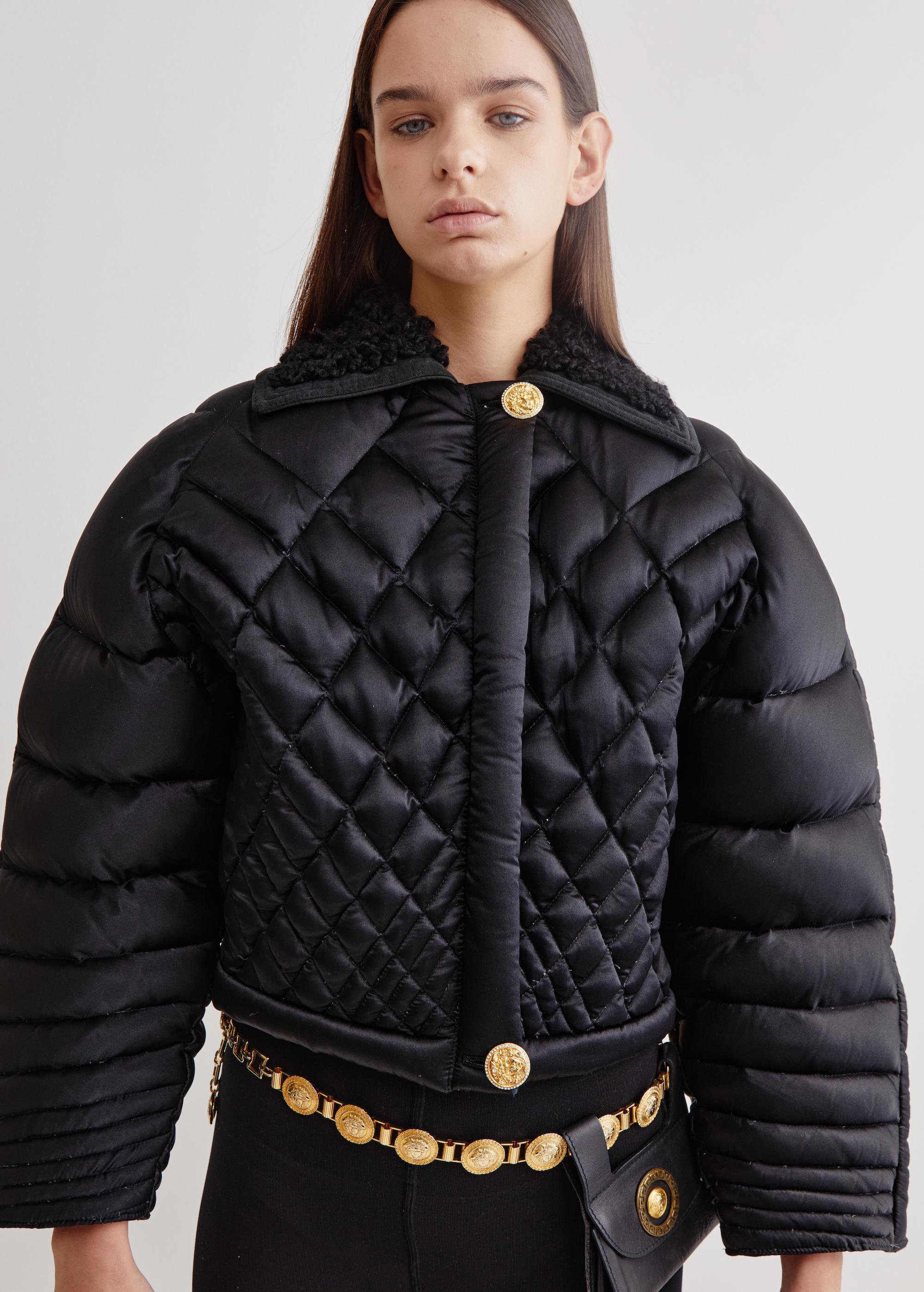 Dating to the iconic & controversial F/W 1992 Gianni Versace Couture 'Miss S&M' collection, this puffer jacket was a key piece appearing in several iterations on the runway as well as being featured in the campaign. Made of a silk/rayon blend, this