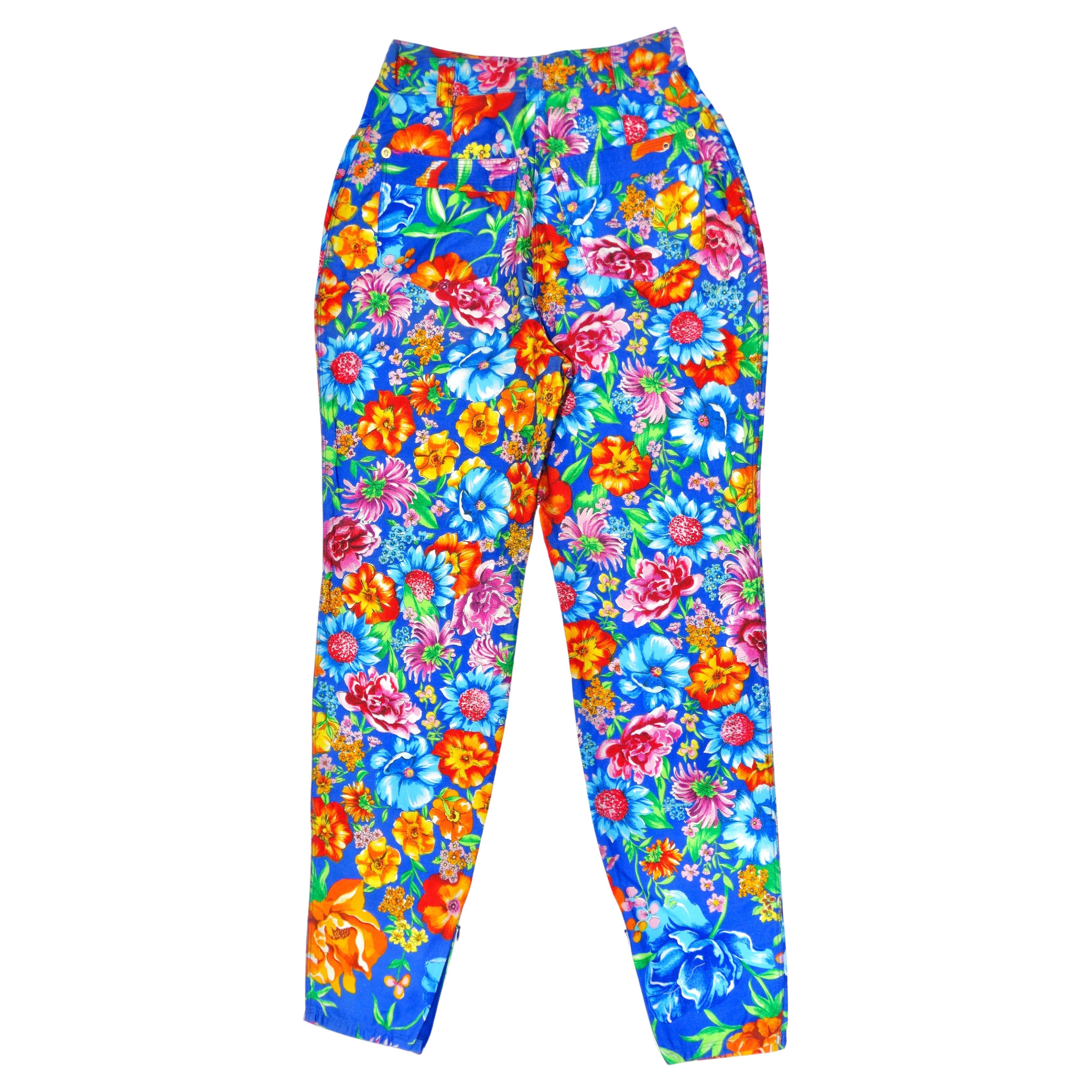 Feel pretty in Versace! These floral printed multi-colored jeans will make you feel flirty and feminine in one easy step. These feature a zipped leg, slight balloon shape, ultra high rise, and a vibrant floral pattern in blue, pink, green, orange,