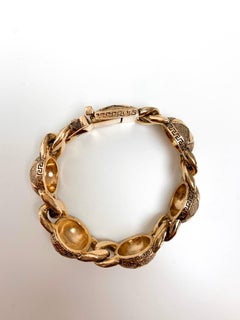 Bracciale con cerchi e stelle in oro Gianni Versace