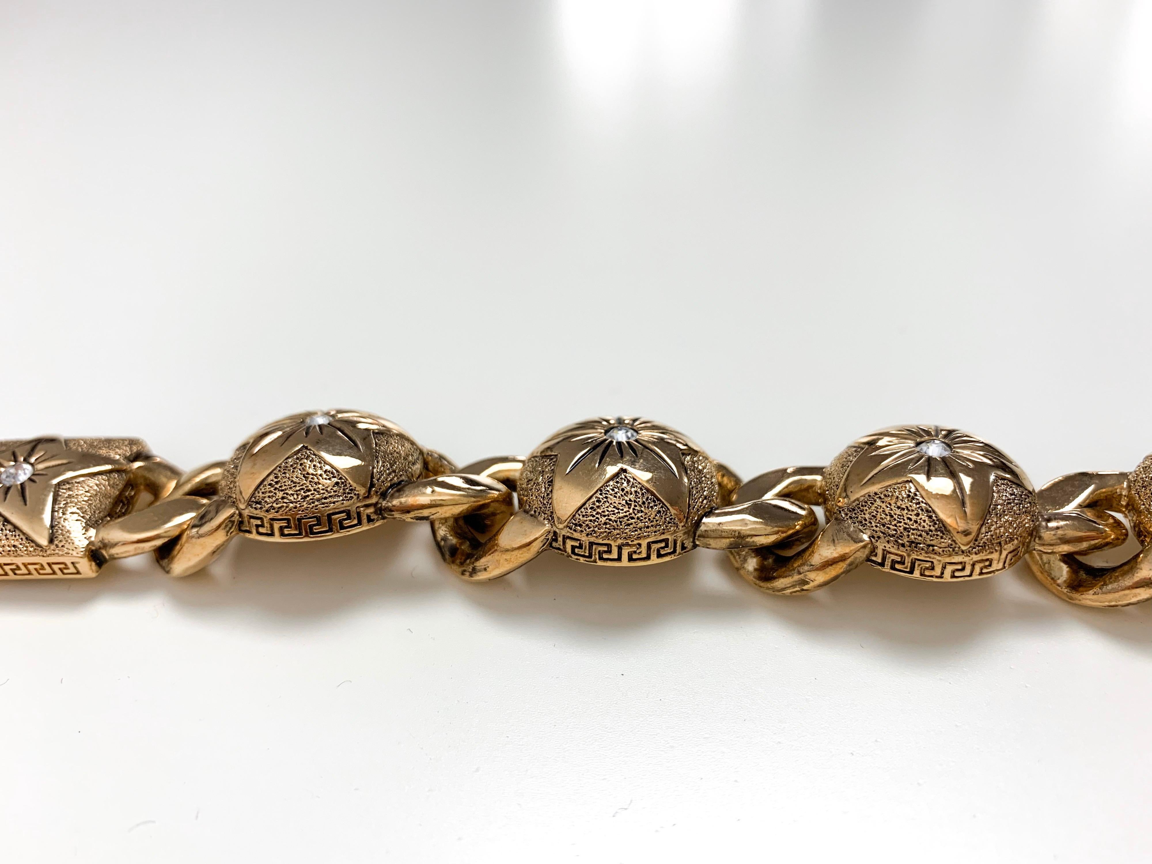 Bracelet cercle et étoile en or de Gianni Versace  en vente 3