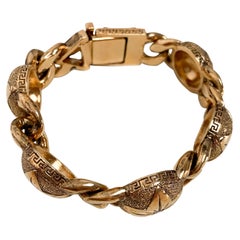 Retro Gianni Versace gold circle and star bracelet 