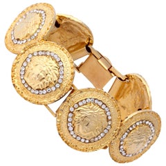 Gianni Versace Gold Toned Bracelet With 6 Medusas and Rhinestones