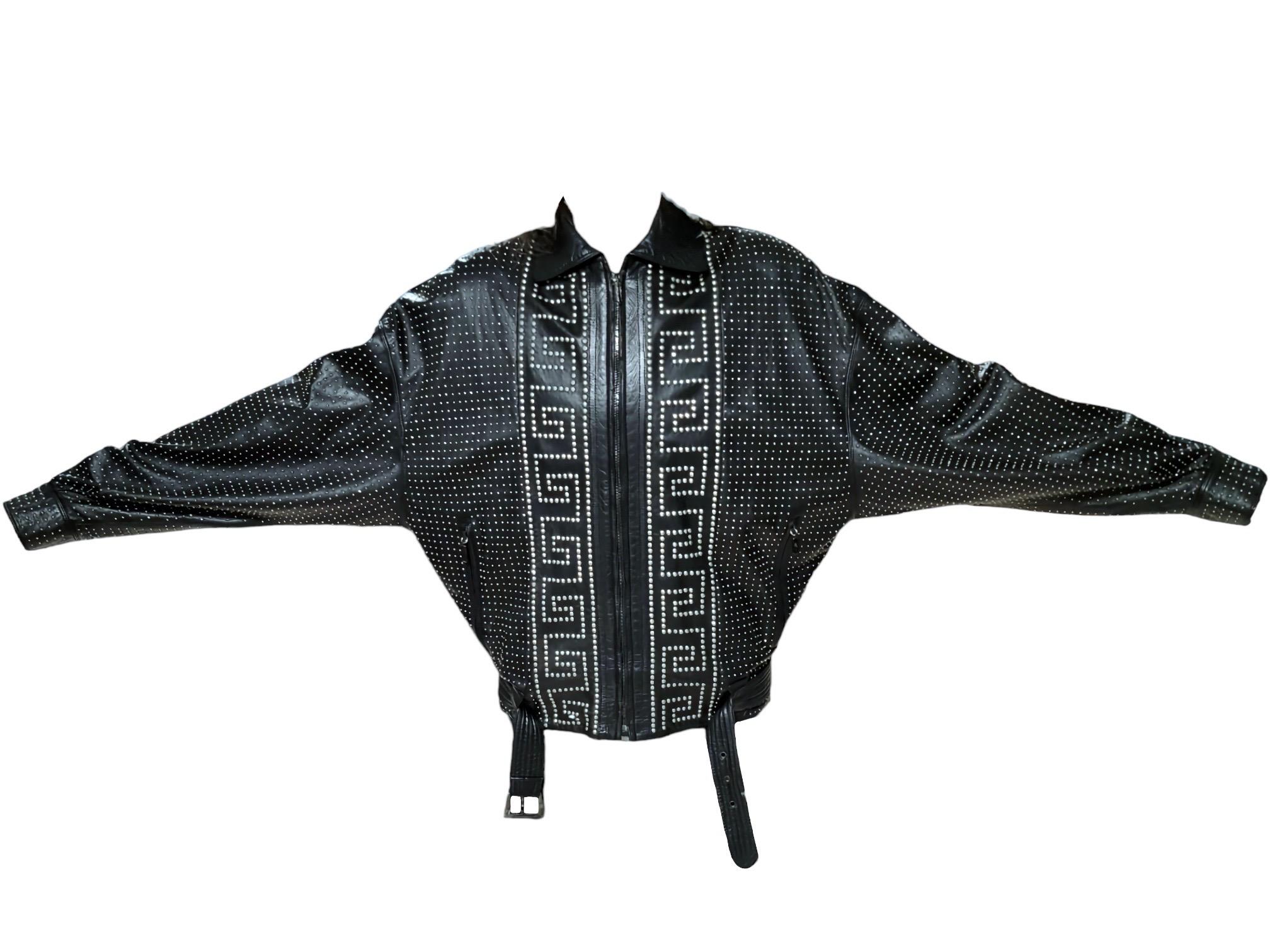 Gianni Versace Greek Key Studded Leather Jacket seen on the Men's Runway from the Spring Summer 1992 Collection.

This extraordinary bomber style leather jacket boasts a captivating array of studs, crafting a mesmerizing visual illusion that exudes