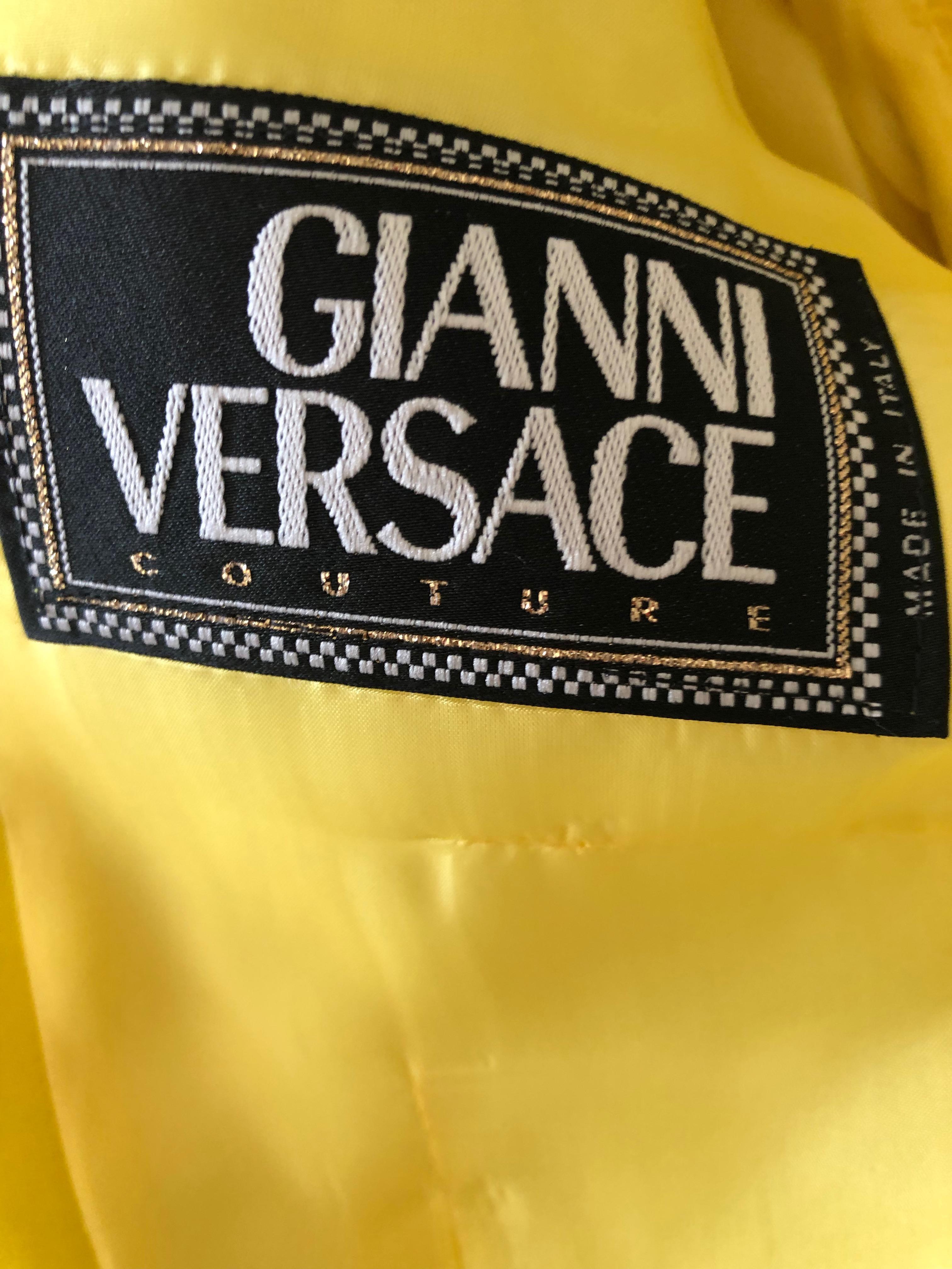 Gianni Versace Iconic Fall 1992 Screaming Yellow Jacket with Leather Details.
Shawl collar with Medusa embellished tooled leather pocket flaps.
Size 40
Bust 38