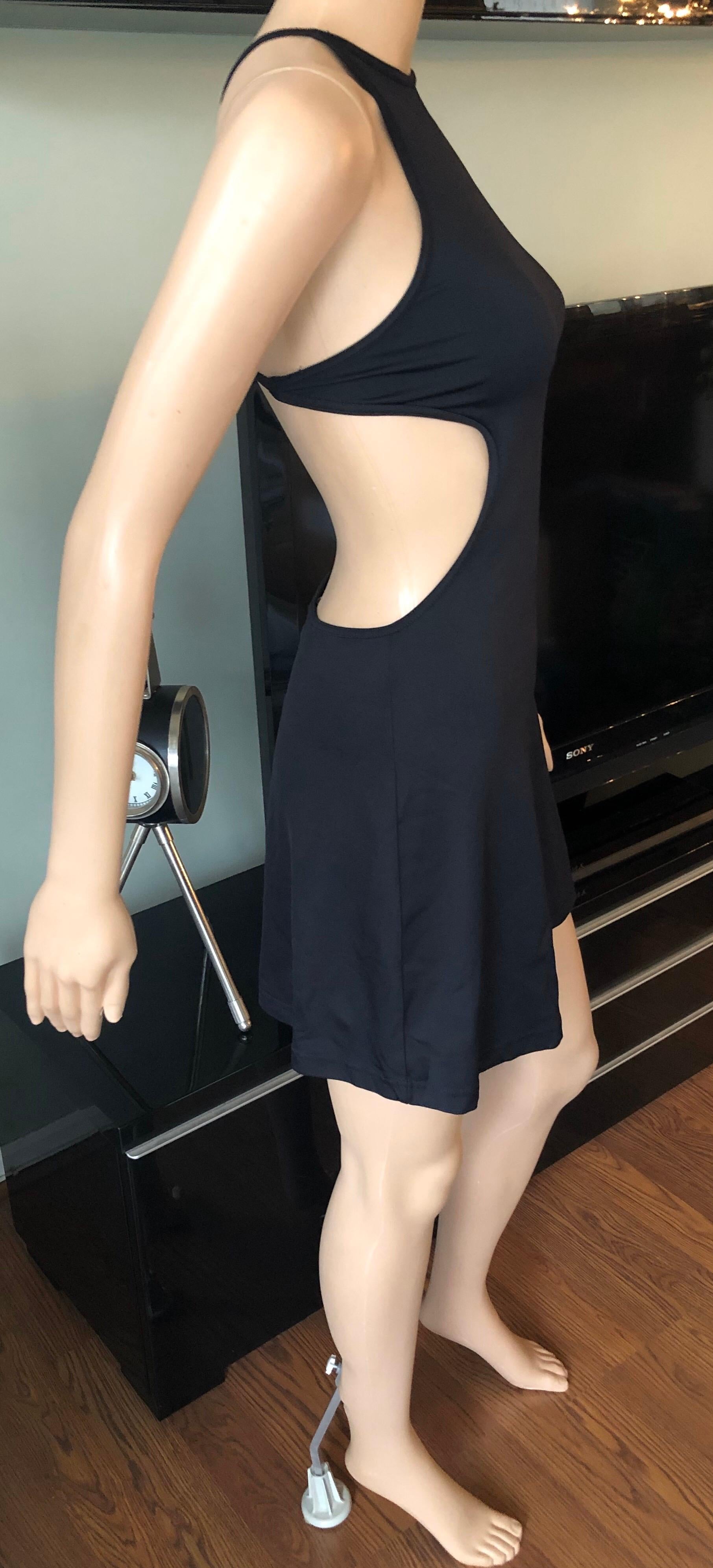Gianni Versace Intensive Vintage C.1990's Cutout Open Back Black Mini Dress IT 42

Versace Intensive vintage mini stretchy dress featuring halter neckline, cutouts, and open back.
