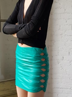 GIANNI VERSACE Leather cut out twisted Mini Skirt, c. 1990s