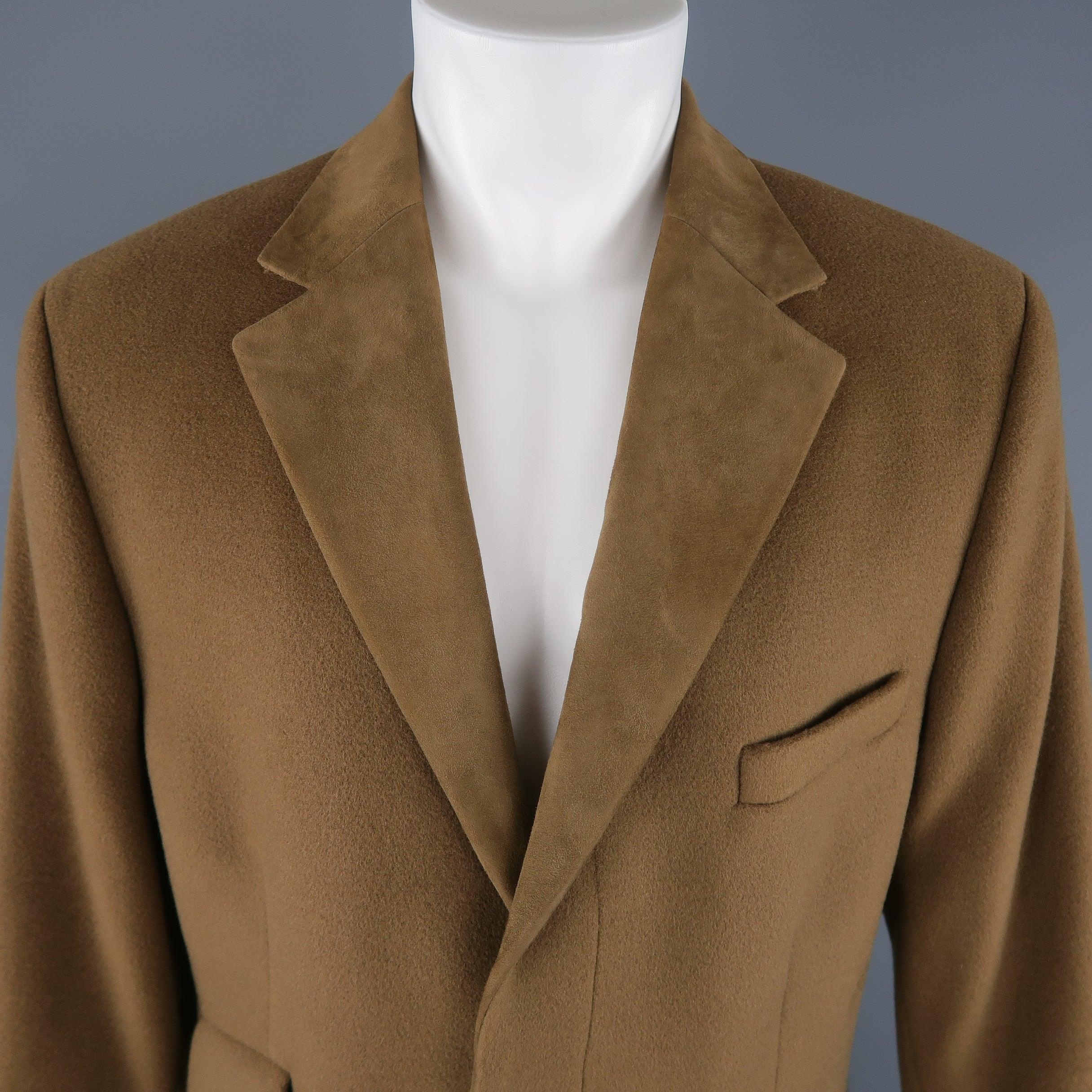 Vintage GIANNI VERSACE over coat comes in light olive green wool with a hidden placket button up closure, triple mock flap pockets, and suede notch lapel. Made in Italy.Excellent Pre-Owned Condition. 
 

 Marked:  M 
 

 Measurements: 
  Chest: 46