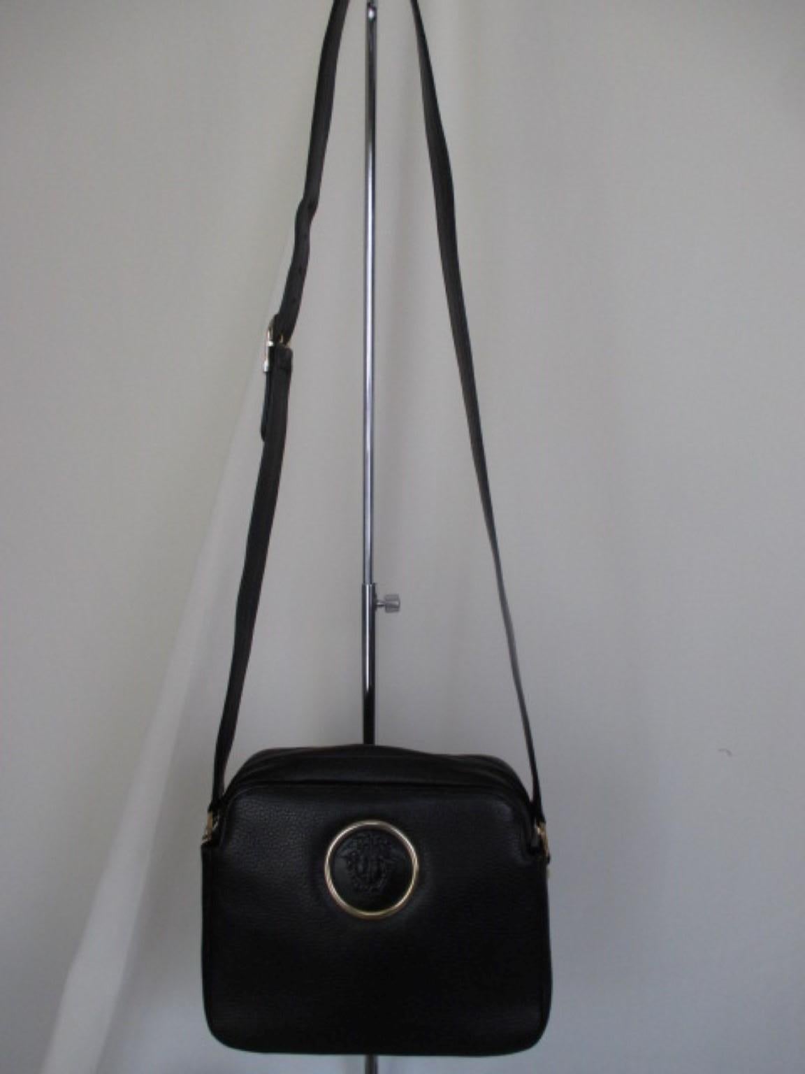 This Versace bag is made with gold hardware.
Color: black
Pre-loved condition
Can be worn as cross body bag
Inside with a zipper pocket and an extra side pocket.
Sizes:  23 cm/9.05 inch x 19 cm/ 7.48 inch x 9 cm/3.54 inch 

Please note that vintage
