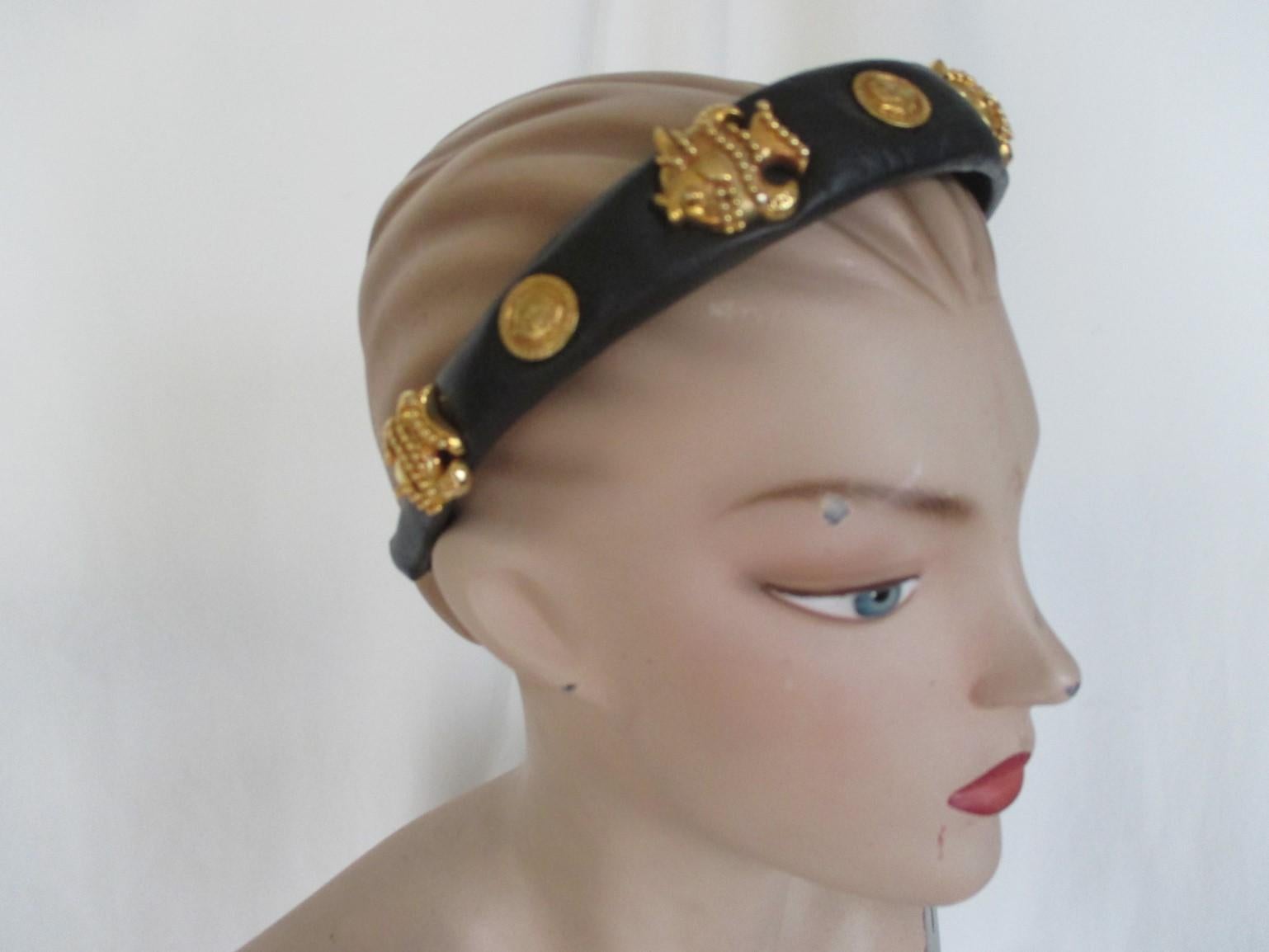 This rare vintage black headband is made of soft leather with gold tone medusa and fishes.
Designer: Gianni Versace
No tags
One size
Please note that vintage items are not new and therefore might have minor imperfections.