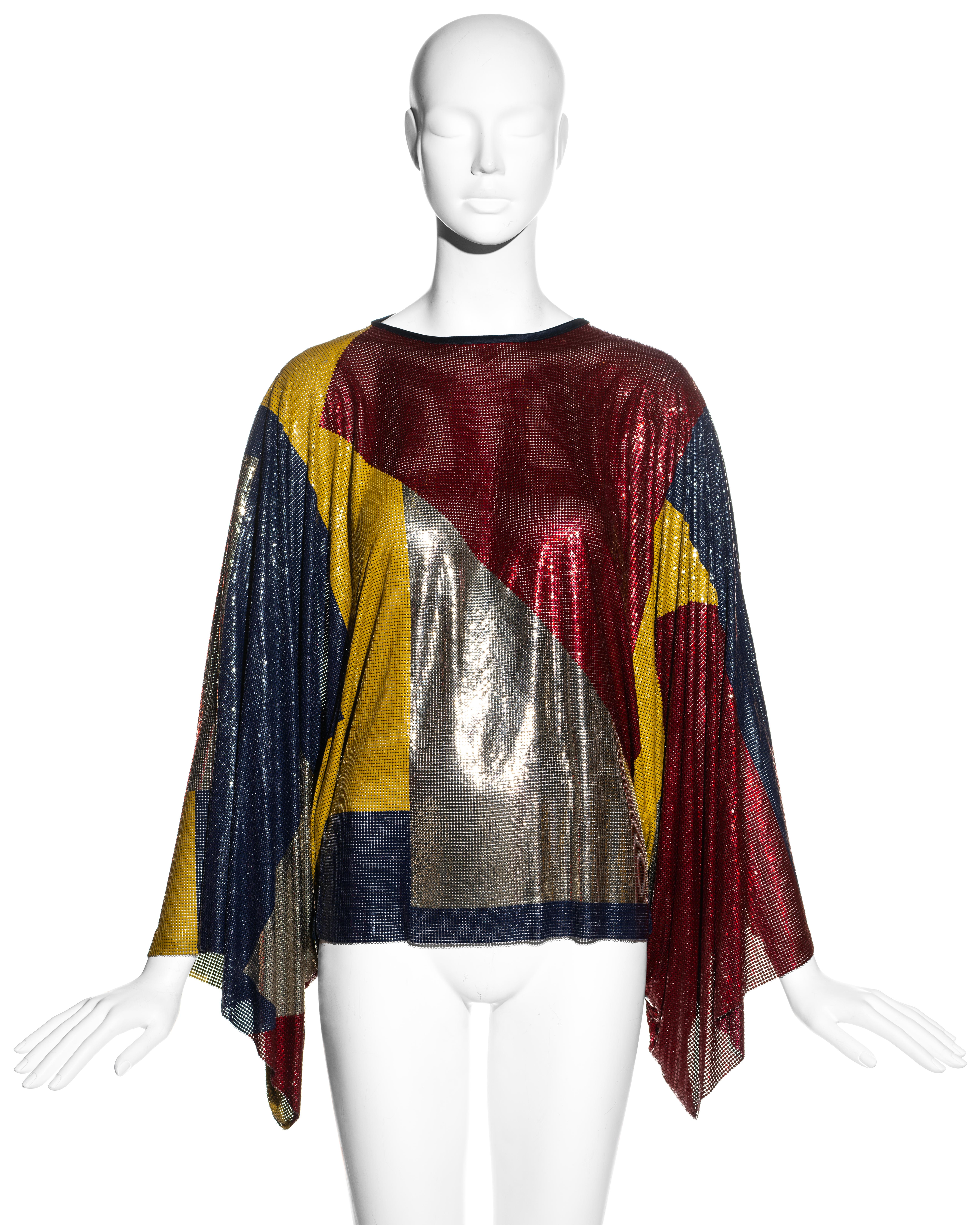 ▪ Gianni Versace multicoloured Oroton chainmail evening tunic
▪ 100% Aluminium, 100% Silk
▪ Wide sleeves 
▪ Silk trim 
▪ Size Small - Medium
▪ Fall-Winter 1984