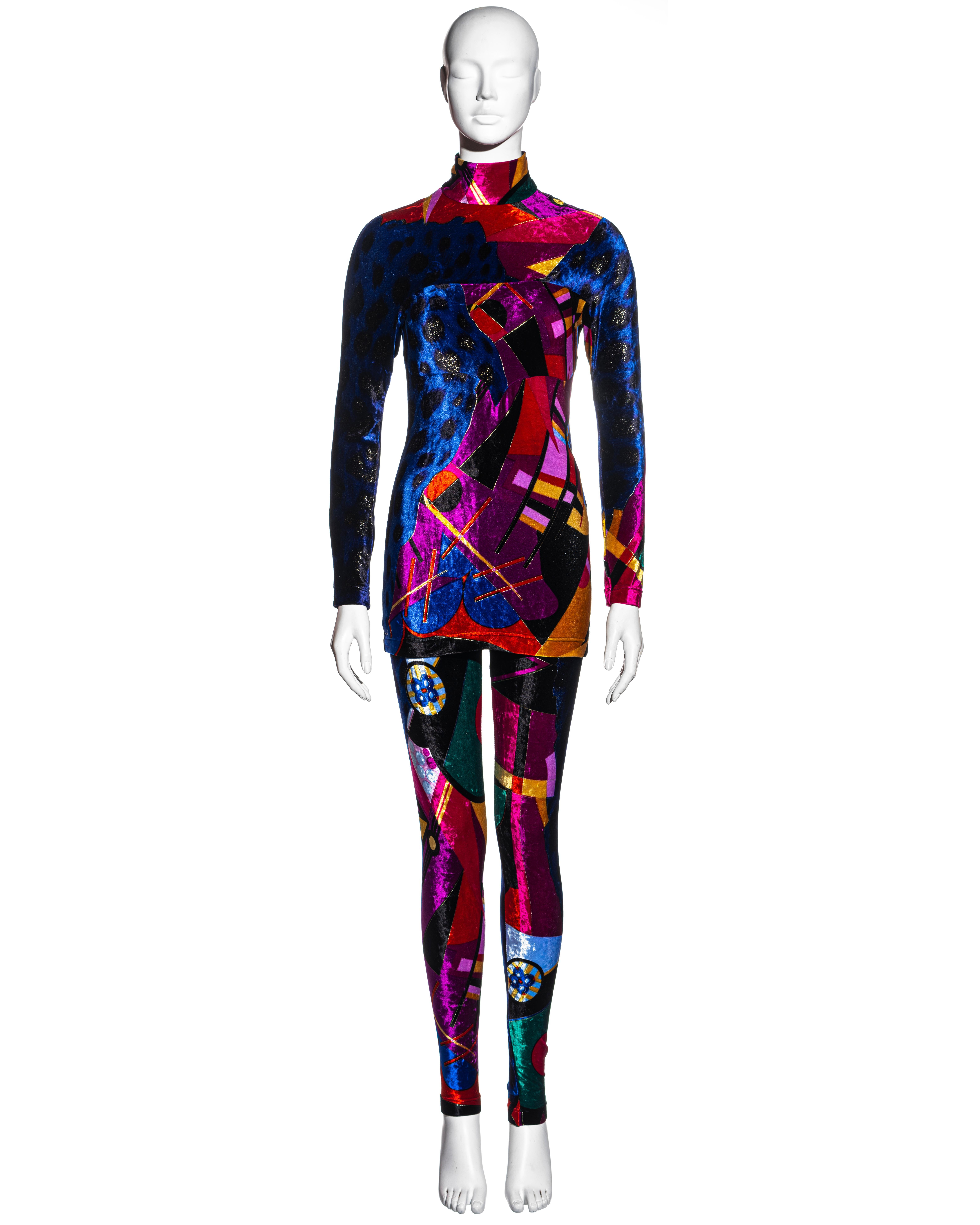 ▪ Gianni Versace multicoloured velvet mini dress and leggings set
▪ All over abstract print in blue, purple, pink, red and gold
▪ Turtle neck mini dress with long sleeves 
▪ High waisted leggings 
▪ Skin tight fit 
▪ Concealed zippers 
▪ IT 42 - FR