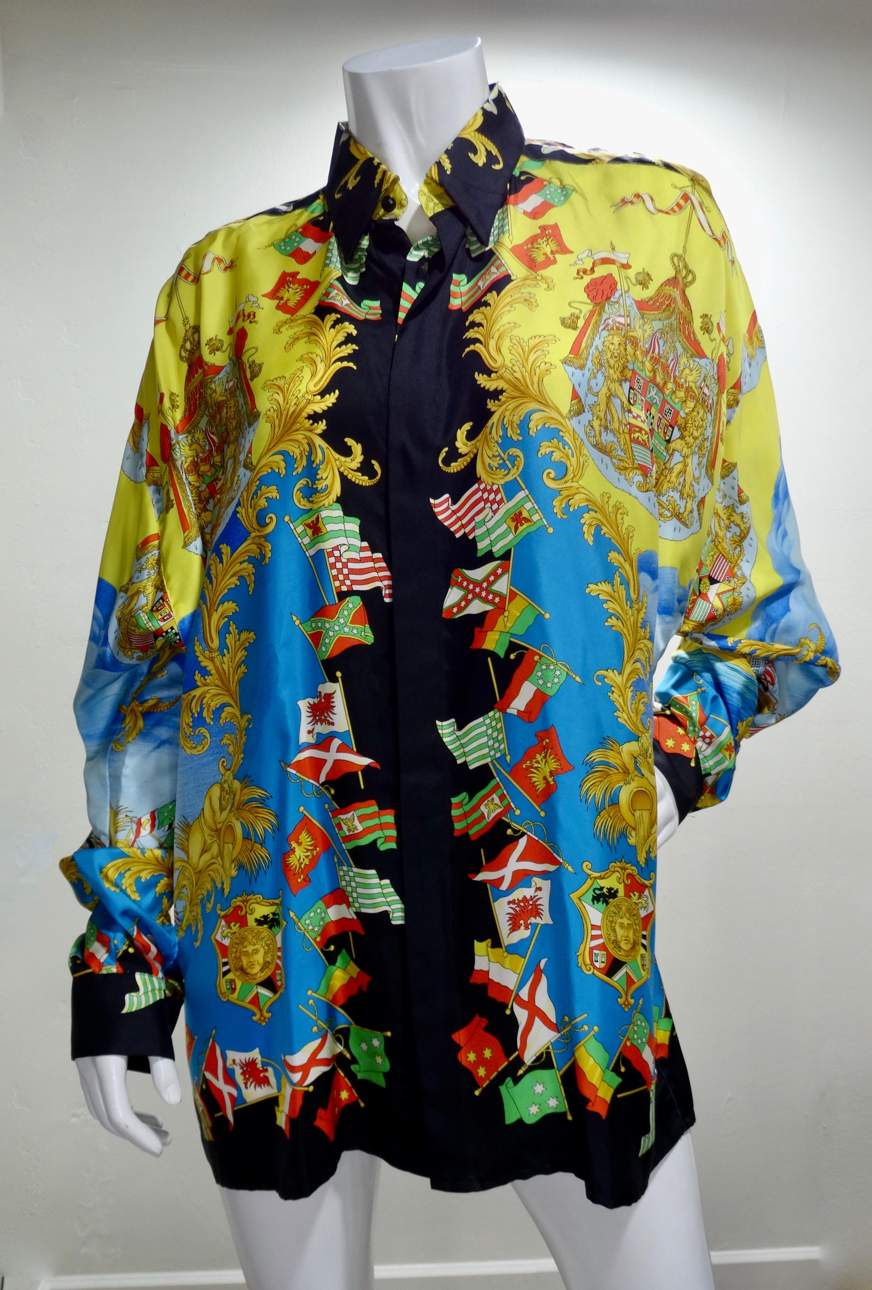 Snag yourself a piece from the Versace archives! Circa 1990s, this silk shirt features a colorful and vibrant nautical motif complete with a variety of flags, sailing ships, crests, Medusa heads and signature Baroque designs. Classic and timeless,