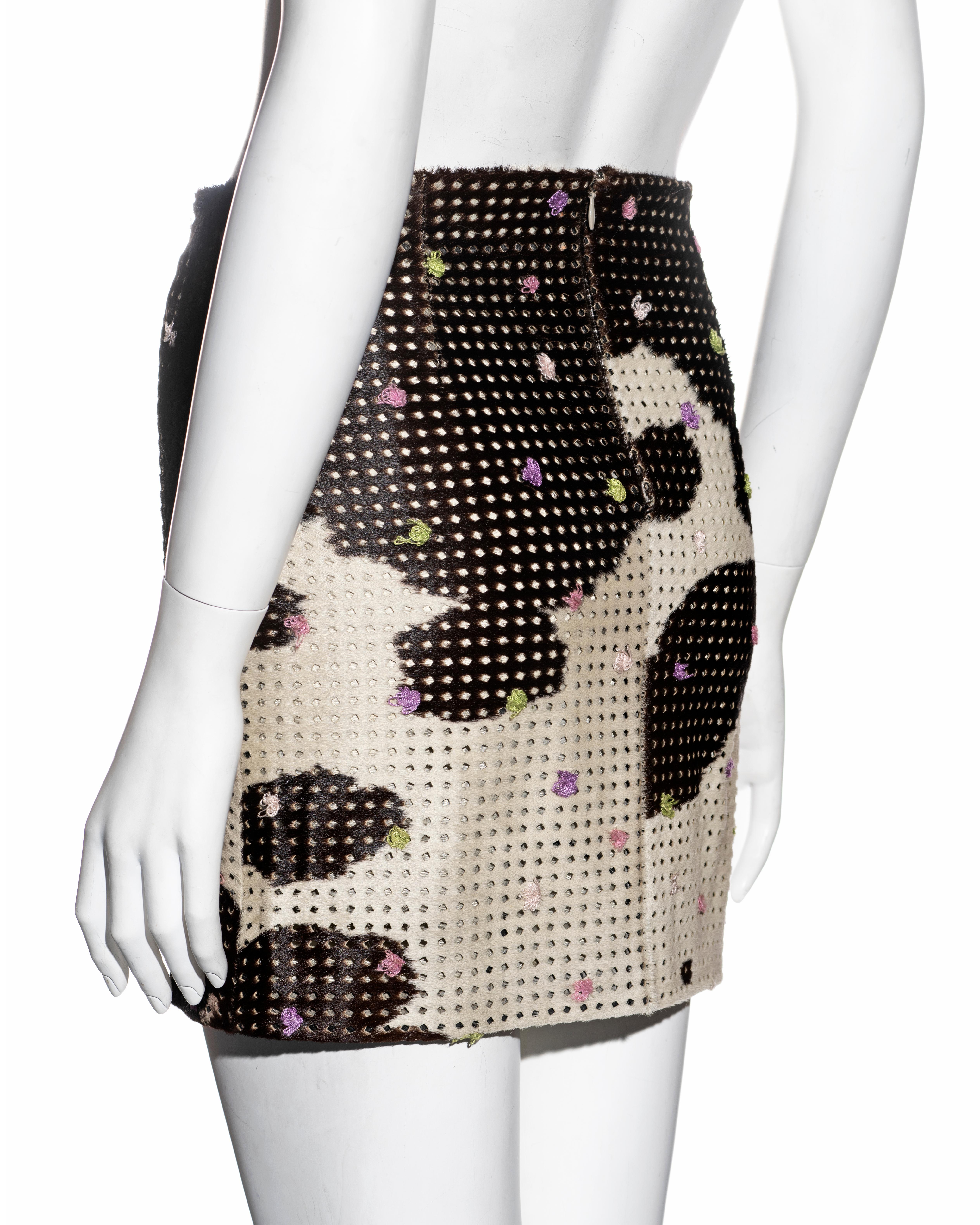 Black Gianni Versace perforated cowhide mini skirt with floral embroidery, ss 1999