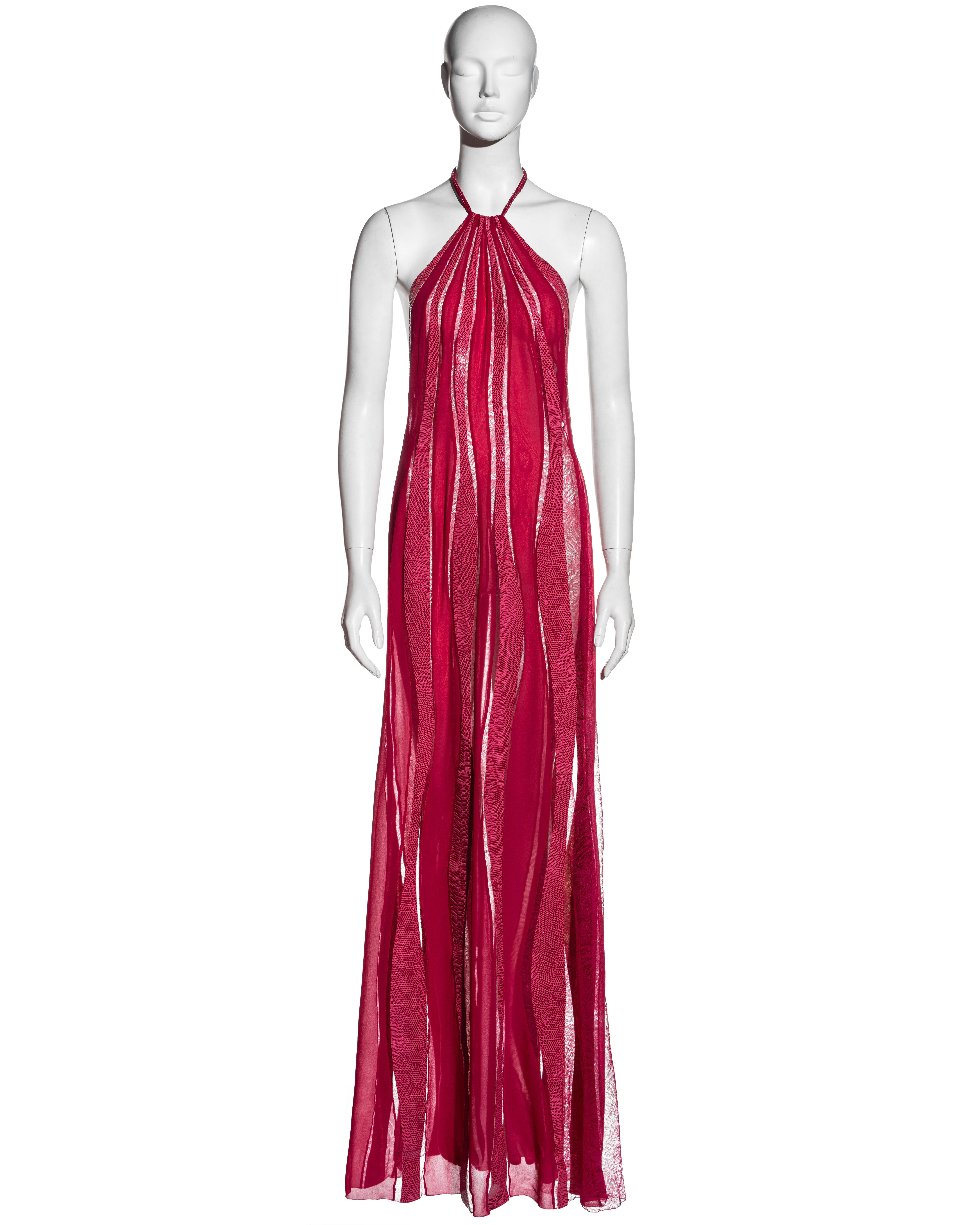 ▪ Gianni Versace pink halter neck maxi dress
▪ Silk chiffon, leather, and net lace panels 
▪ Hatlerneck embellished with crystals 
▪ Open low back 
▪ Concealed zipper at center back 
▪ IT 42 - FR 38 - UK 10 
▪ Fall-Winter 2000
